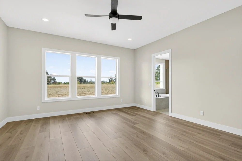 A bedroom overlooking the property — Carus Road.