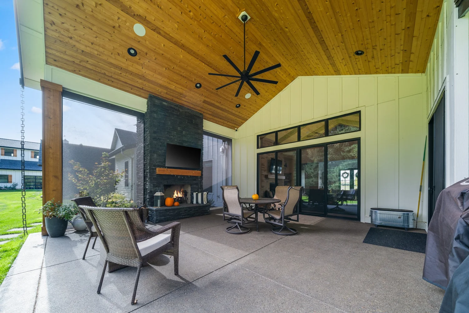Outdoor living by the fireplace — Generations at Meridian.