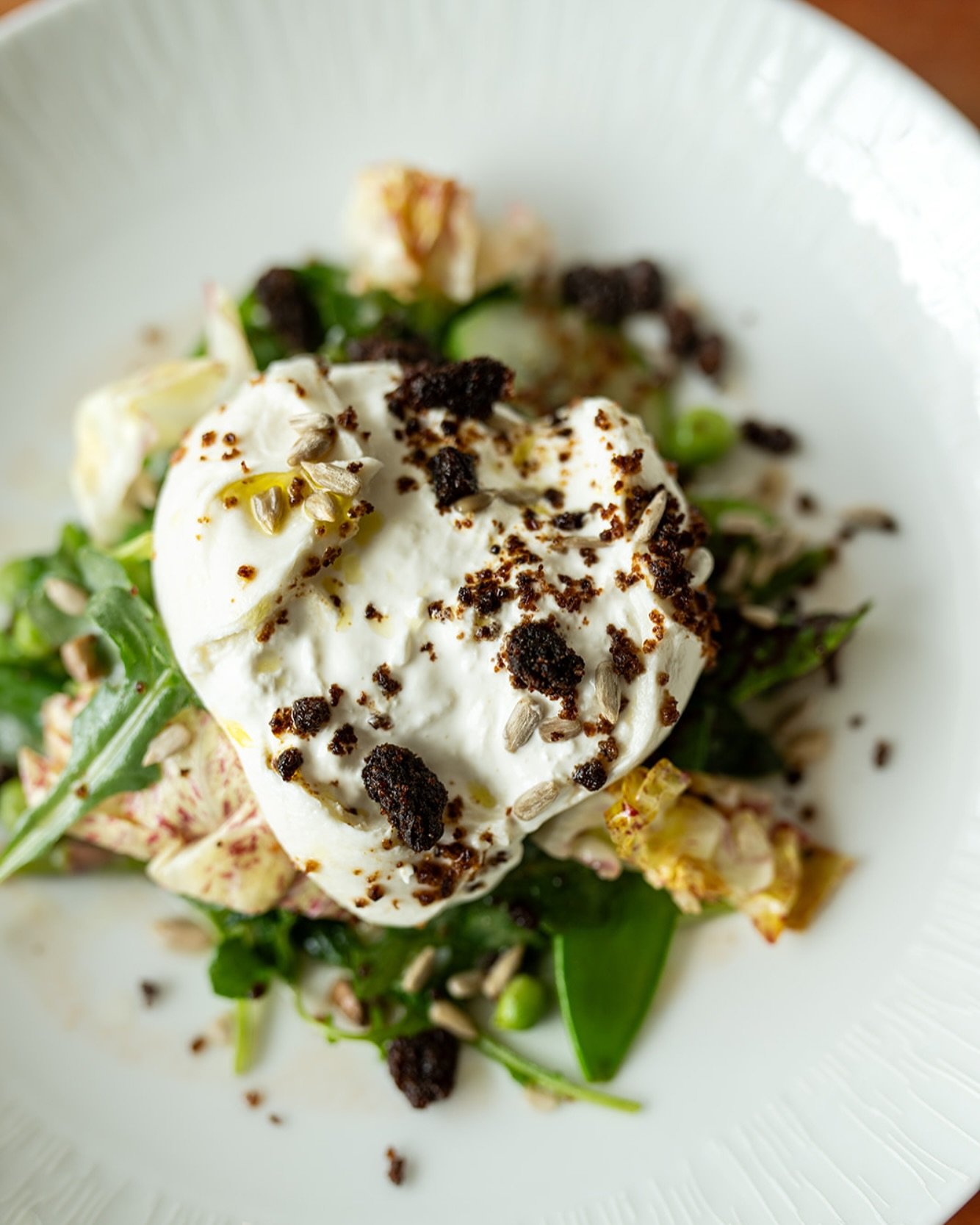 Enjoy this vibrant dish featuring creamy burrata paired with crisp spring vegetables—peas, asparagus, and crunchy sunflower seeds—served alongside hearty black bread
Join us for Dinner at 5:00
#lucastonybrook