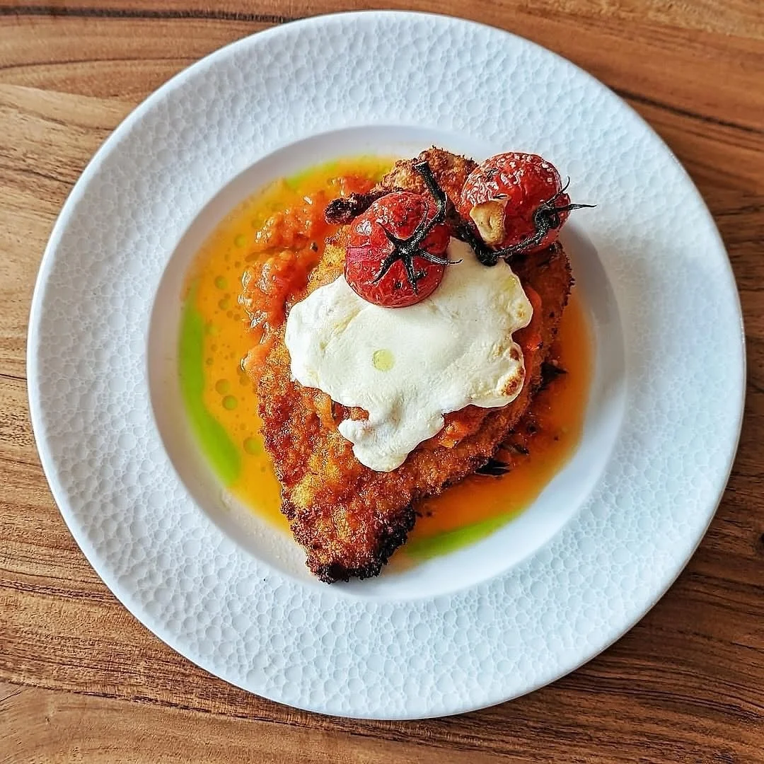 Chicken Parmesan 

Served with Pomodoro sauce, Fresh Mozzarella, Organic Basil, and Blistered Tomatoes. 

#lucastonybrook