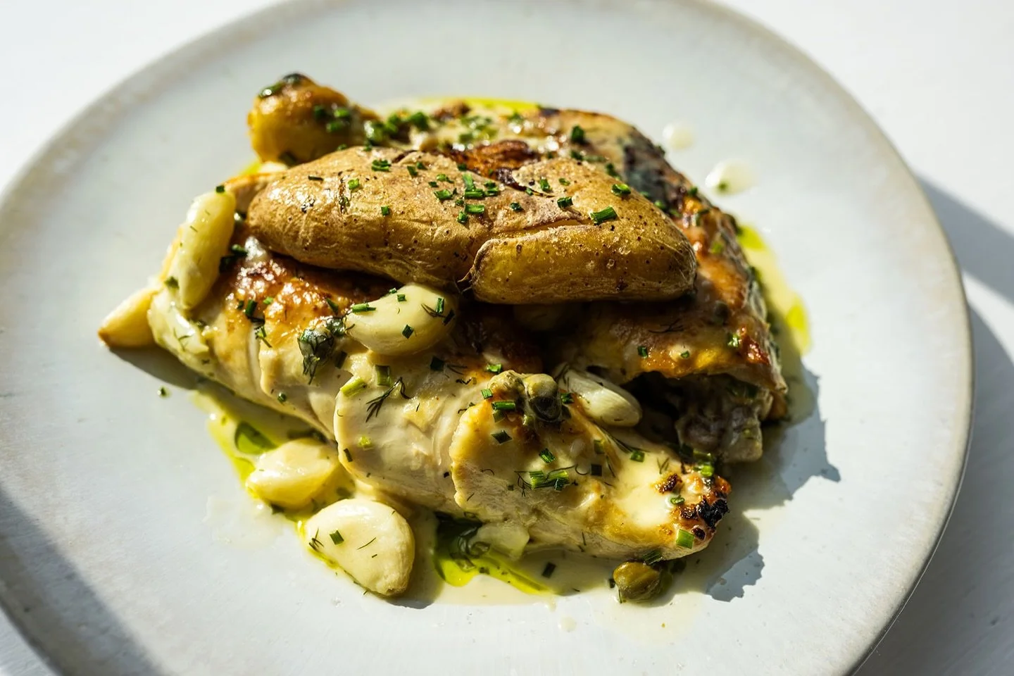 A classic✨

Roasted Chicken with cr&egrave;me fra&icirc;che, fingerling potatoes, chives, and jus &mdash; best enjoyed with a glass of wine and good company.

#lucastonybrook