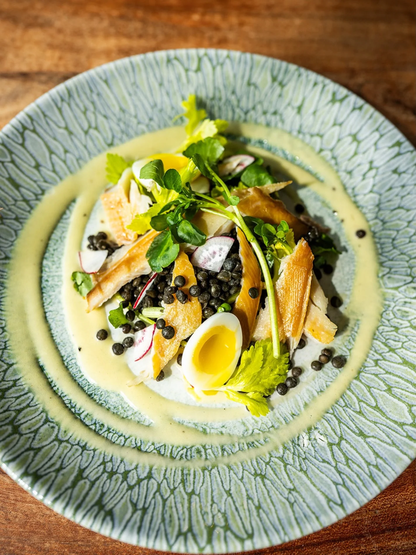 Fresh flavors ✨

Our Watercress &amp; Smoked Trout features delicate smoked trout paired with lentils, quail egg, and dijon for a bright, balanced bite.

#lucastonybrook