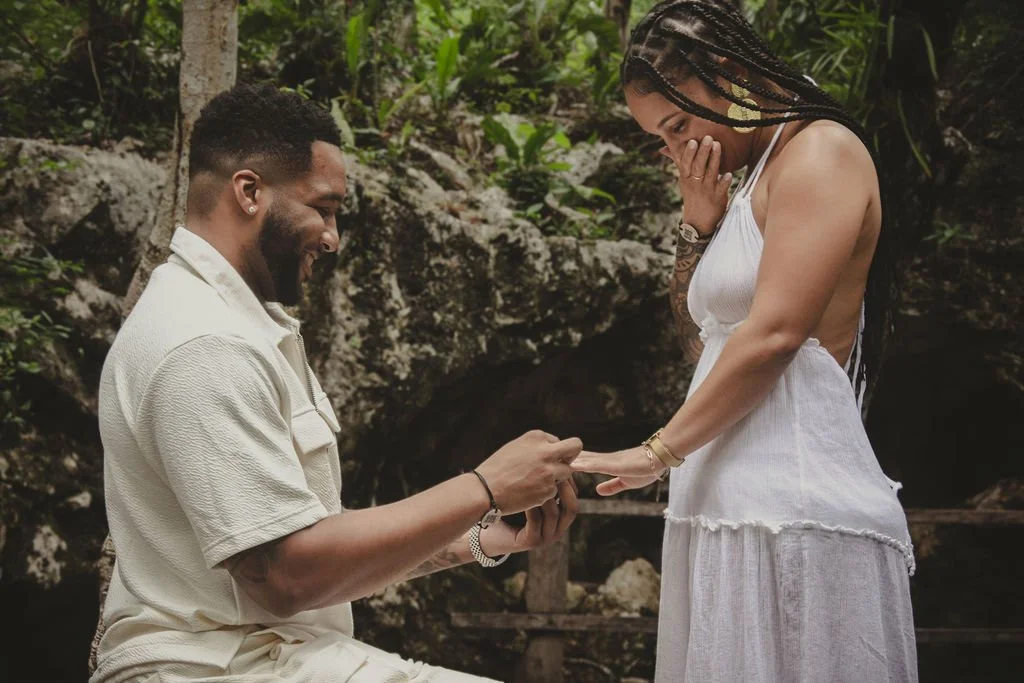 Man proposing to woman in a Private Cenote in Tulum.