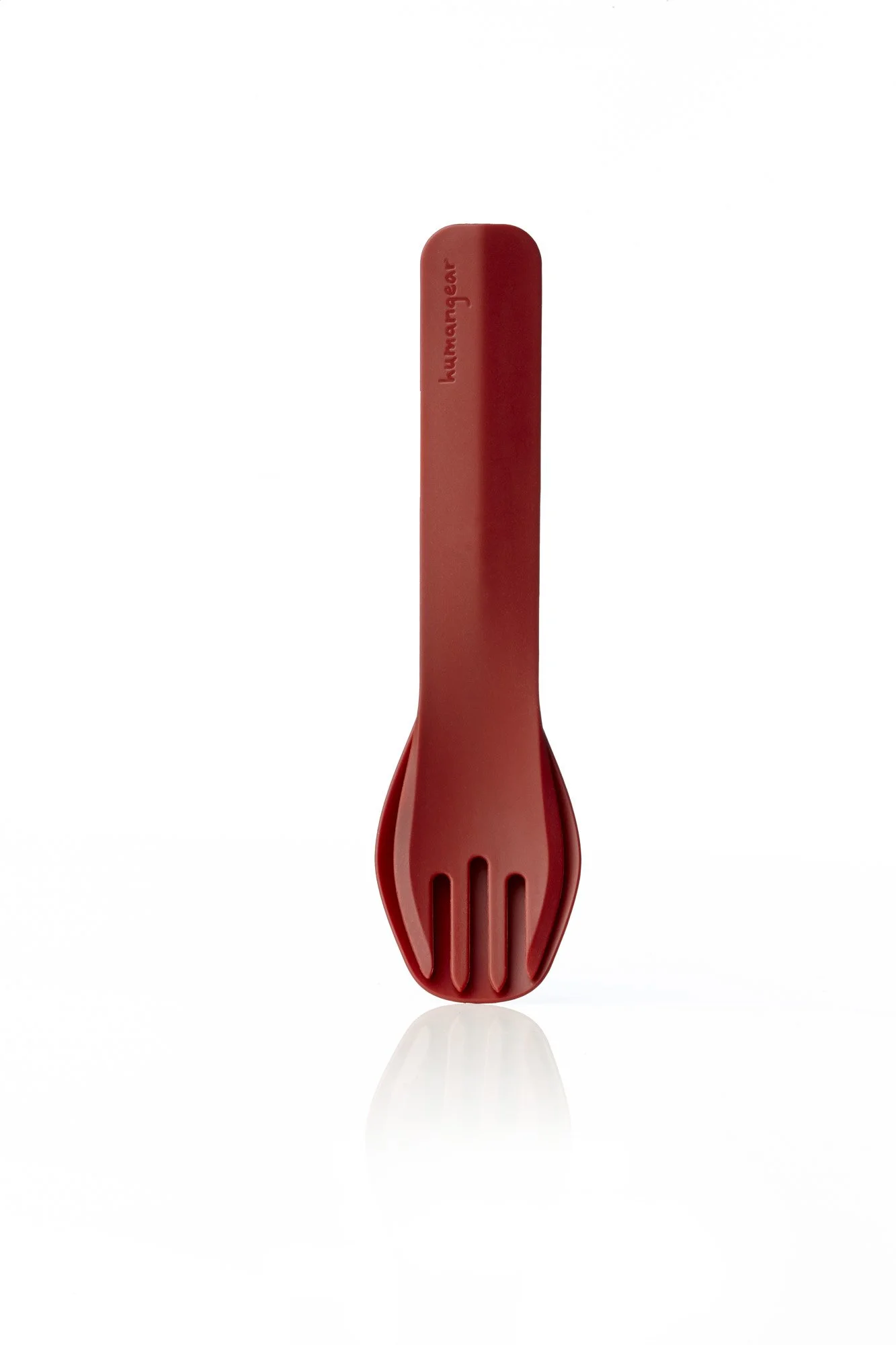 Red spork on white background