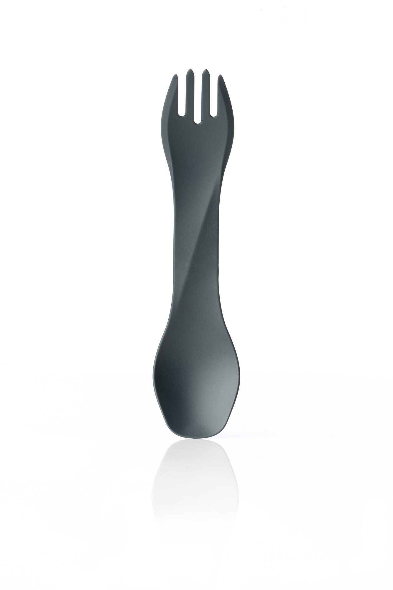 Black spork standing on a reflective surface against a white background.