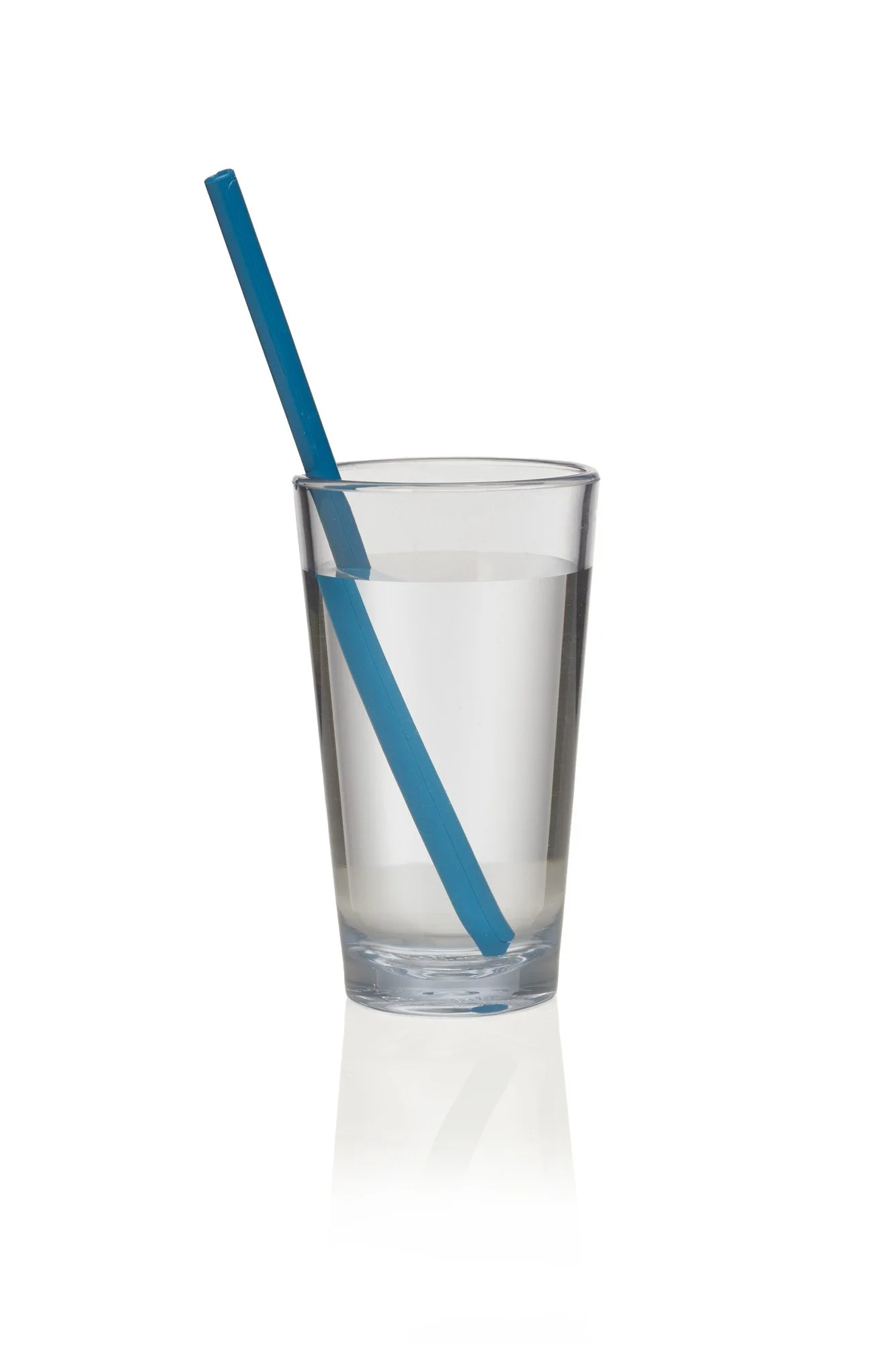 A clear glass of water with a blue straw on a white background.