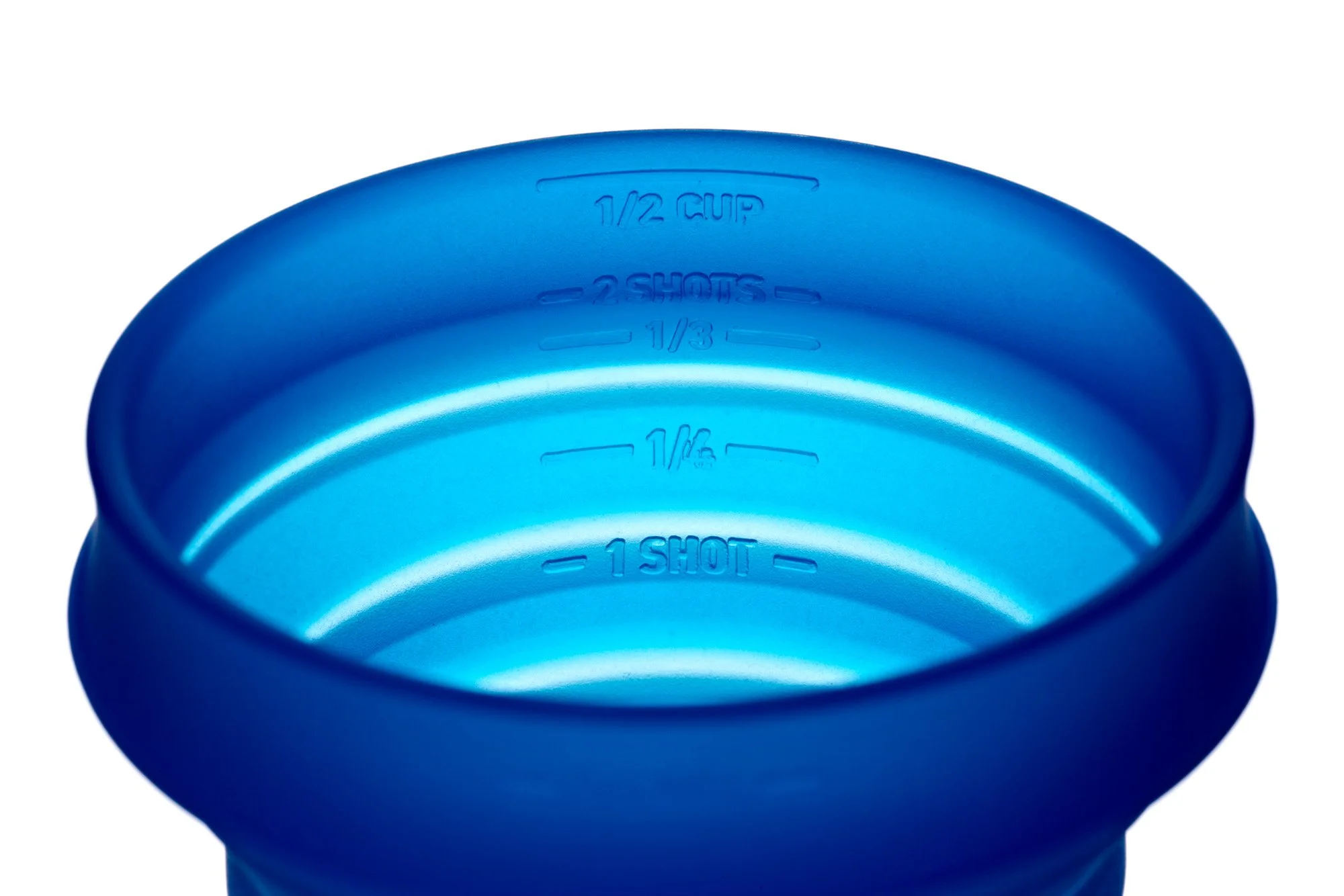 Blue silicone measuring cup with volume markings