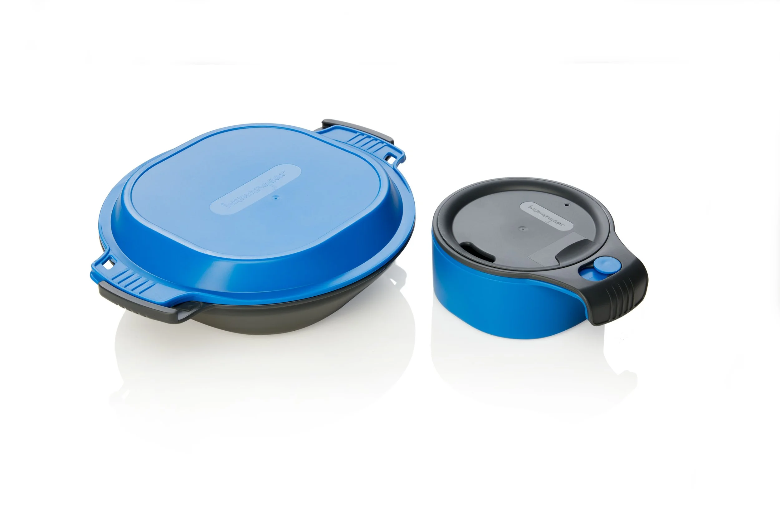 Blue kitchen storage containers; one large with handles and one medium with a snap-on lid.