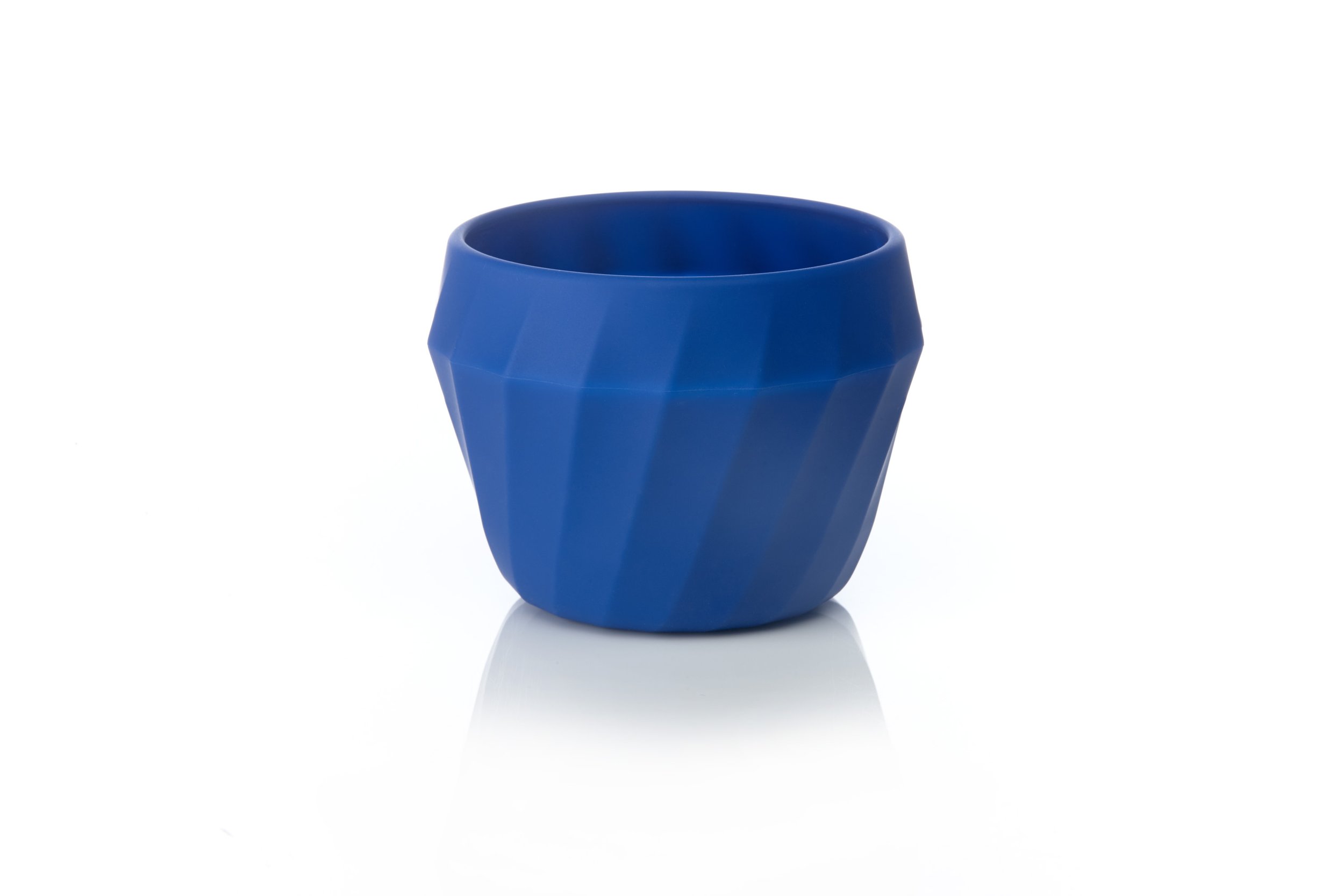 Blue geometric cup on white background