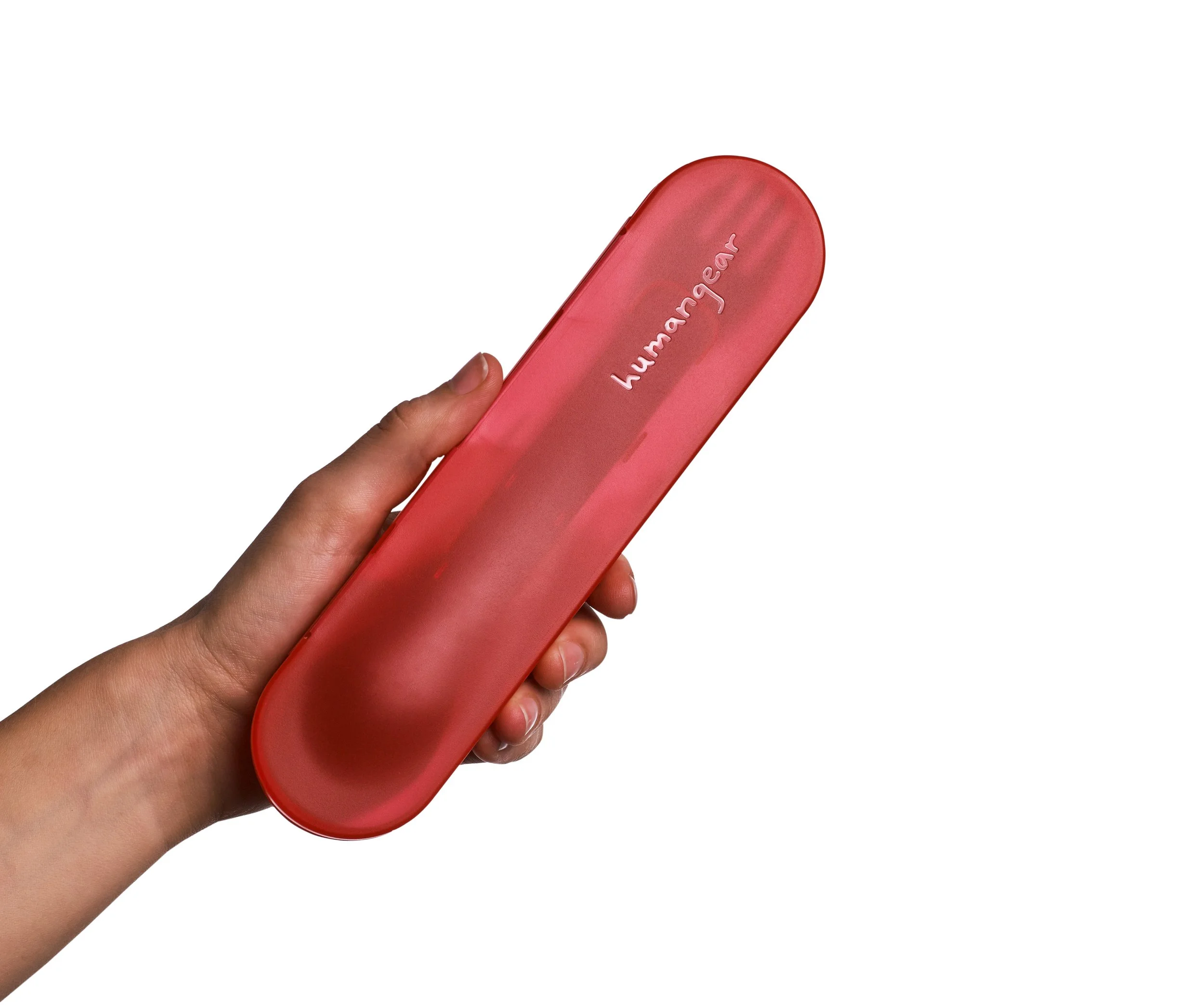 Hand holding a red Humangear utensil case