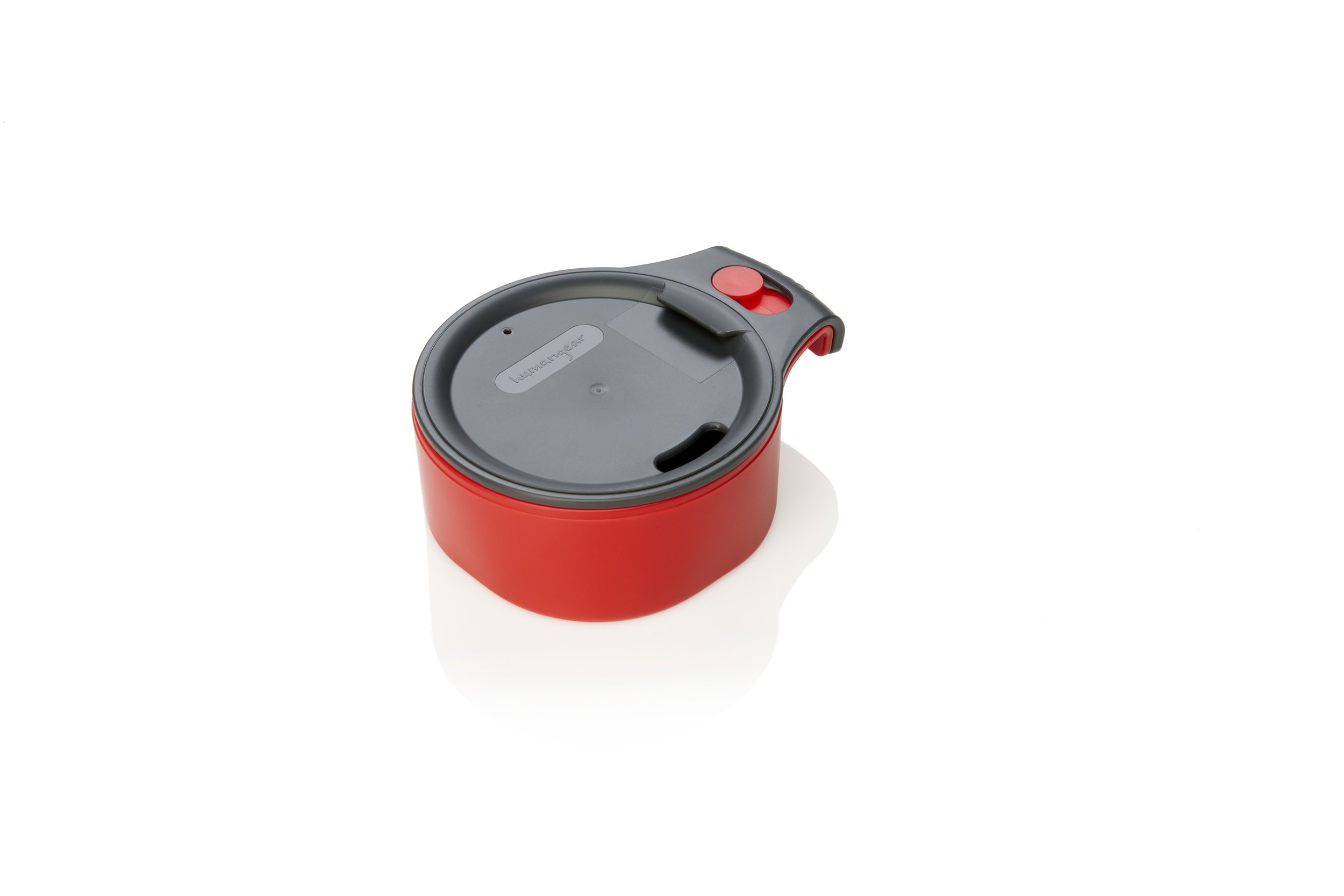 Red travel mug with a gray lid and a handle on a white background.