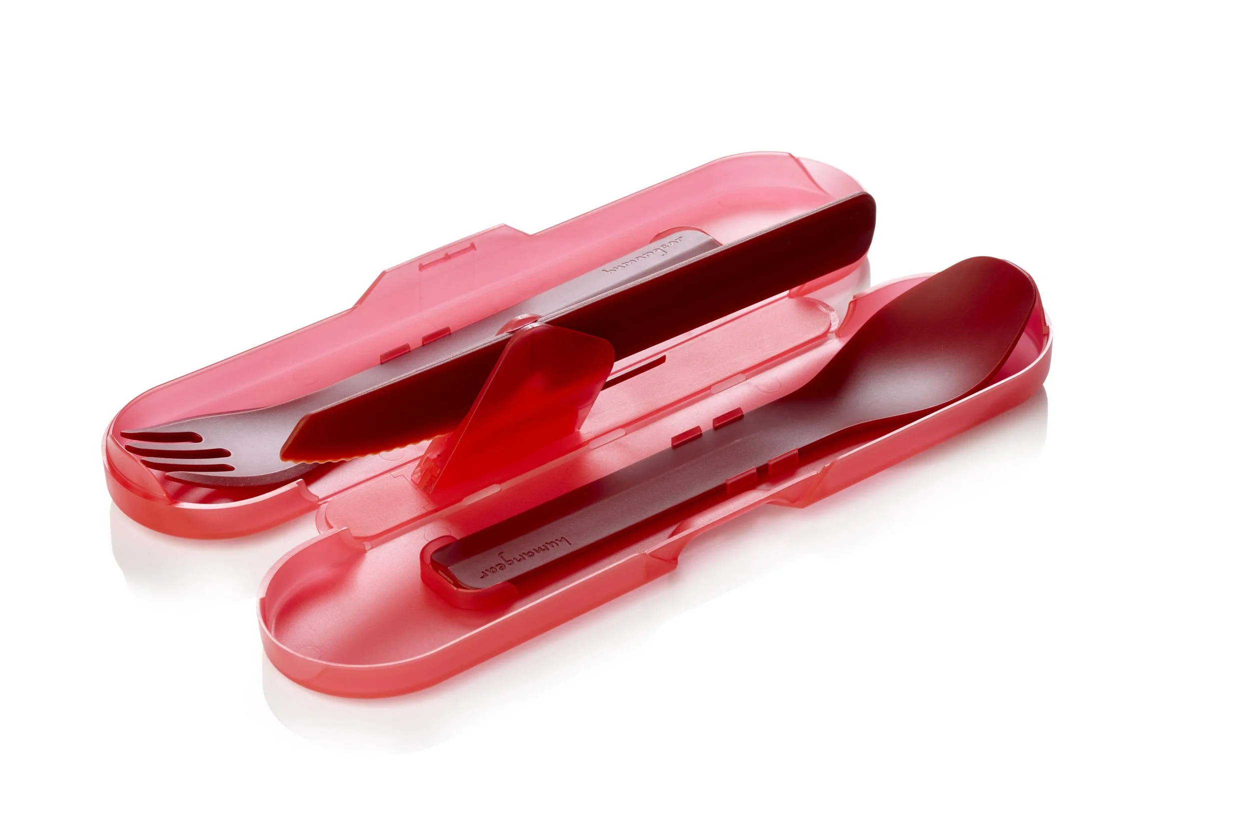 Red travel cutlery set with fork and spoon in a red plastic case