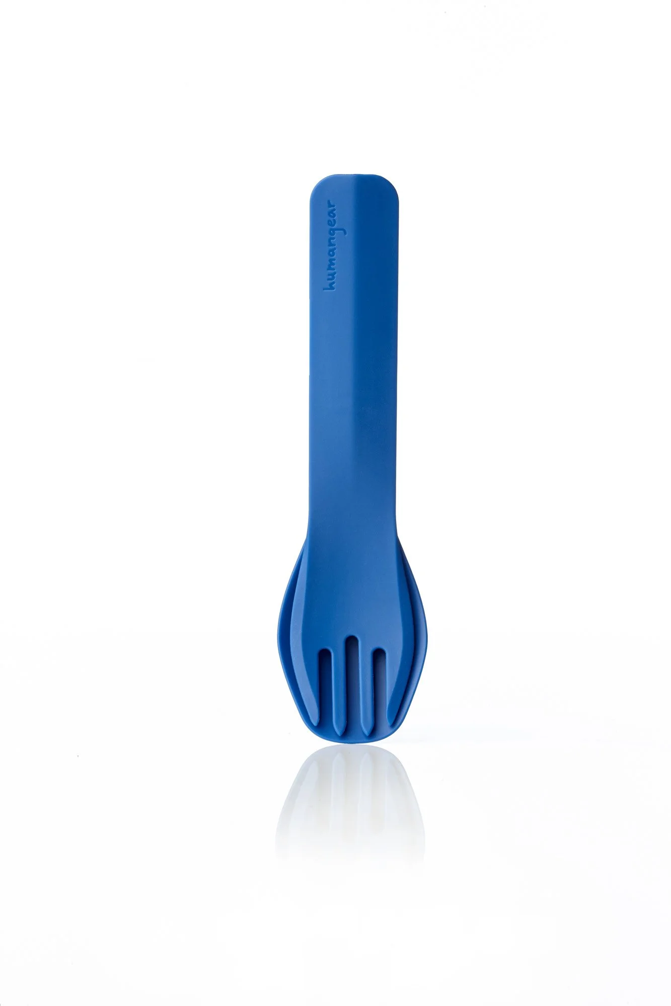 Blue plastic spork on white background