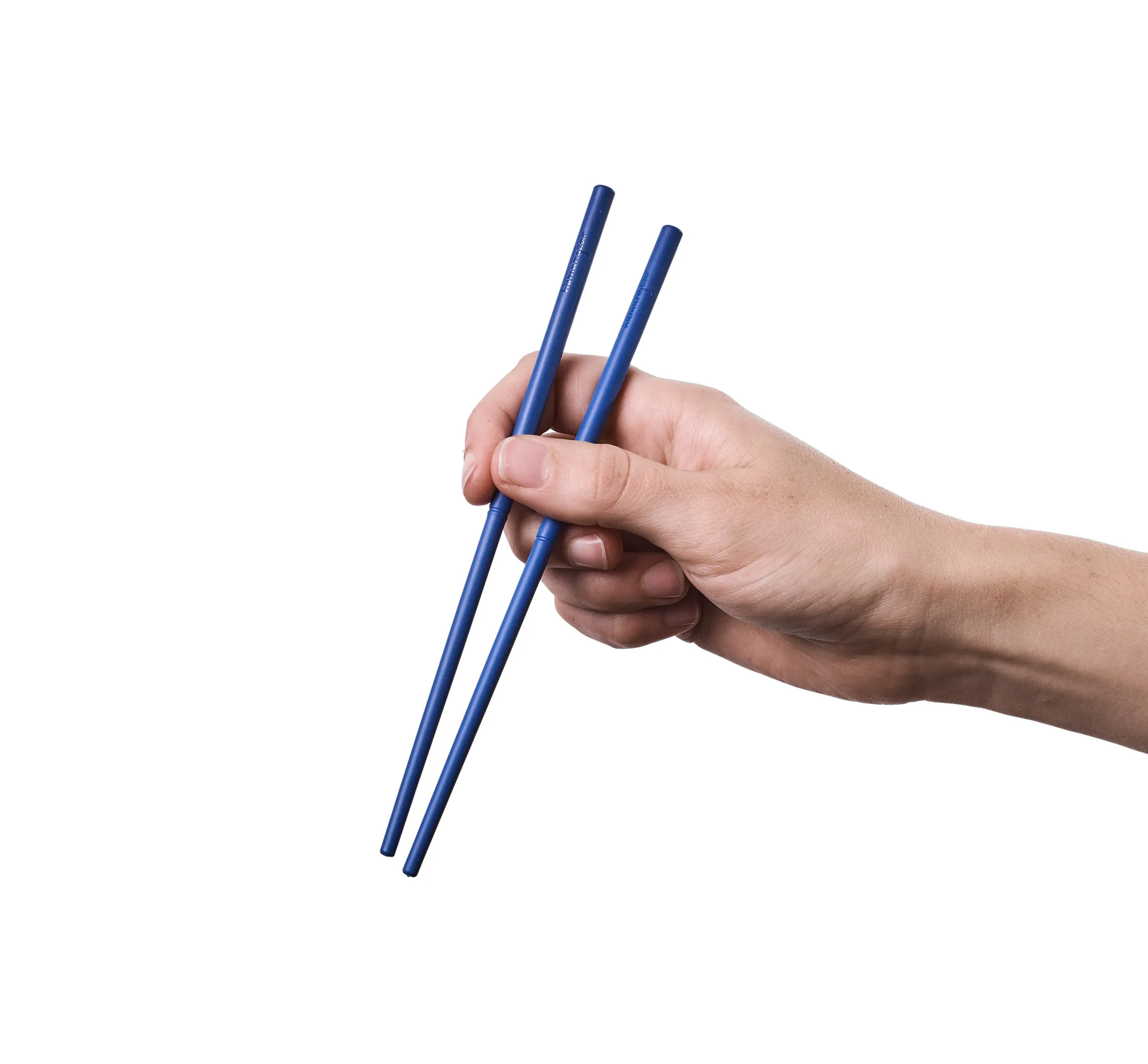 Hand holding blue chopsticks isolated on white background