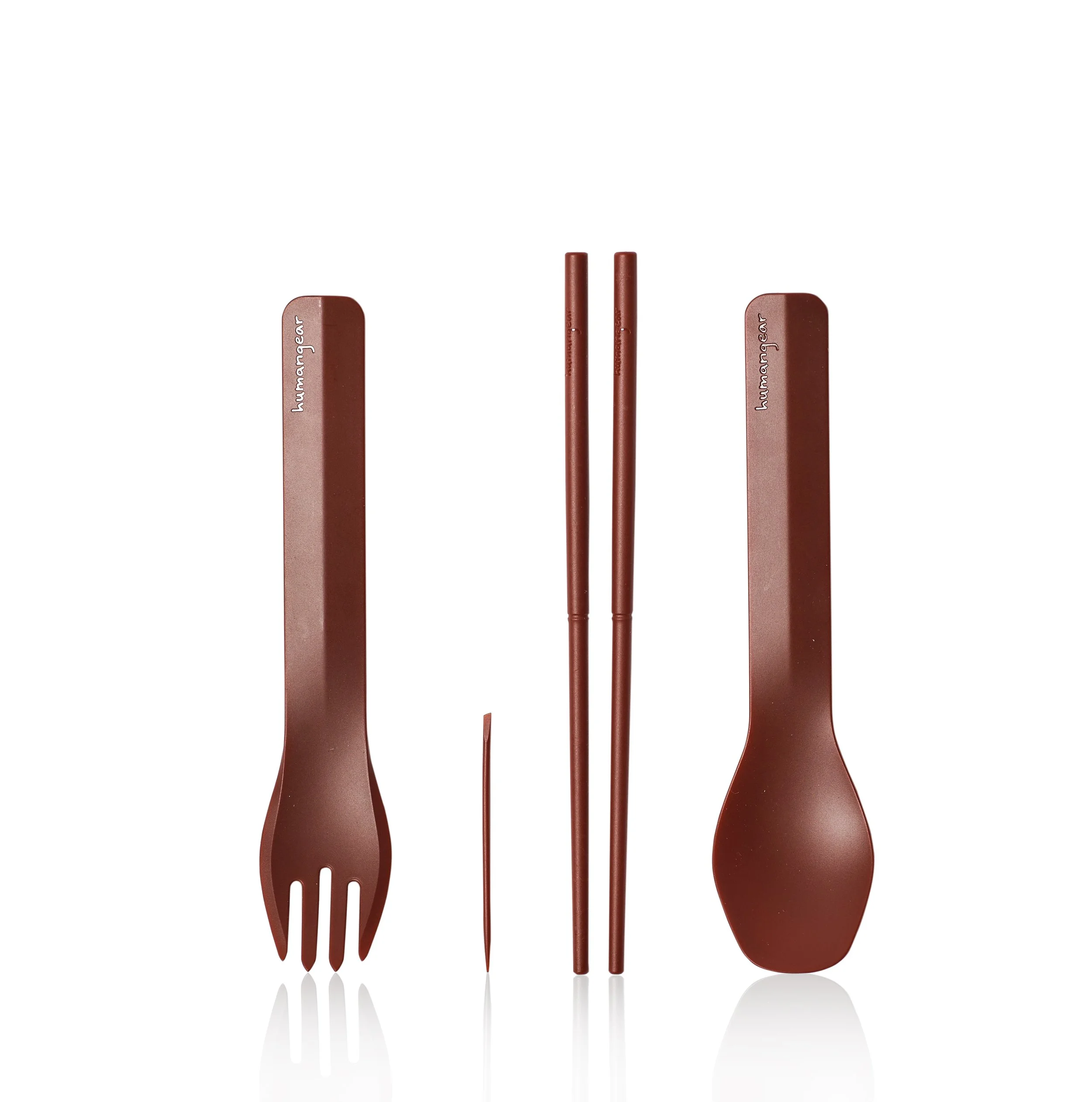 Brown reusable utensil set including a spork, chopsticks, and a spoon on a white background.