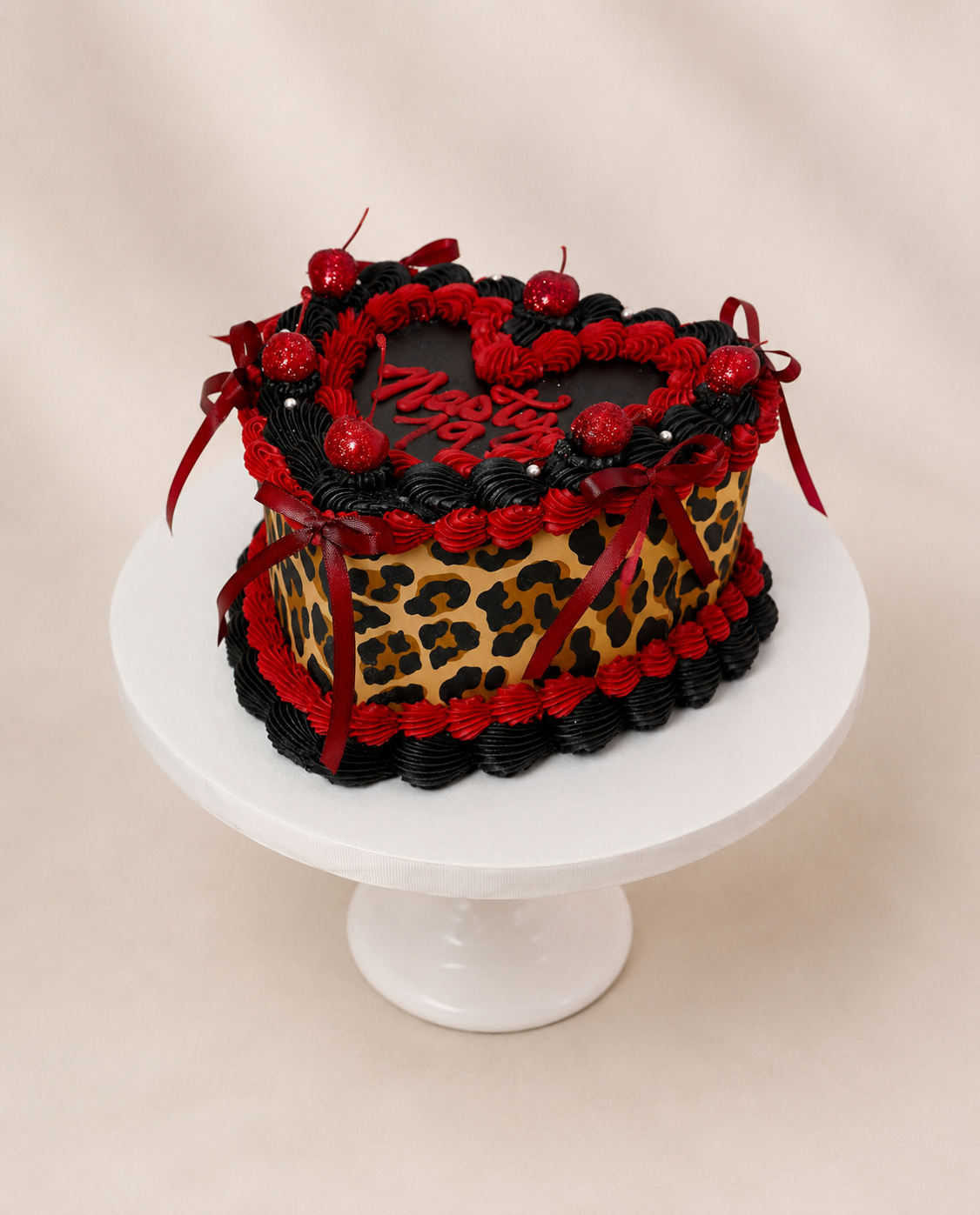 Red & Black Nasty 19 Leopard Heart Cake.png