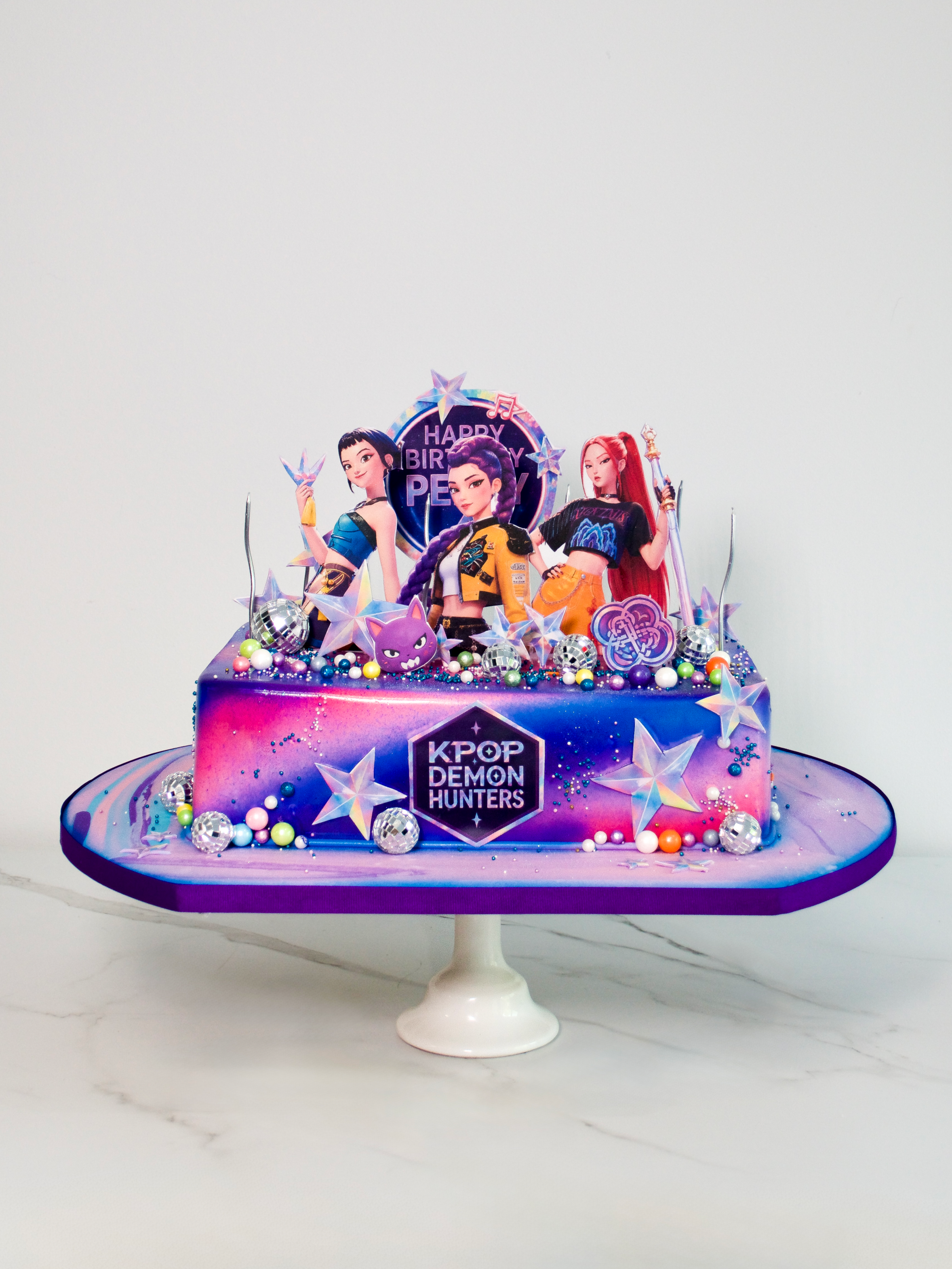K-Pop+Demon+Hunters+Cake.png