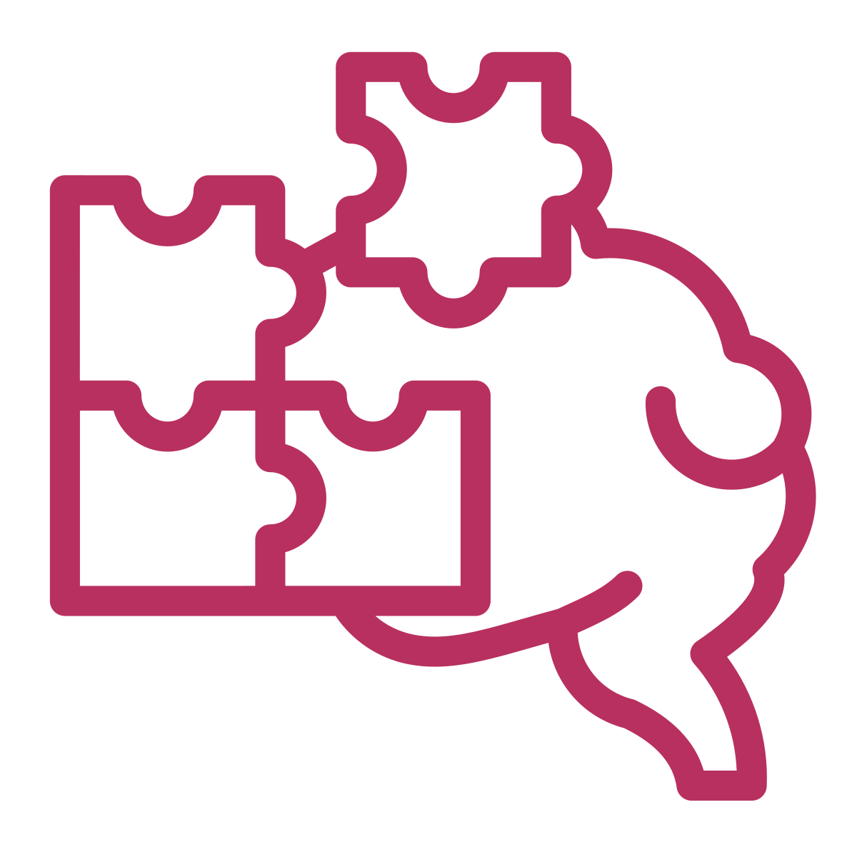 Outline of a hand holding puzzle pieces connected to a map of South America.