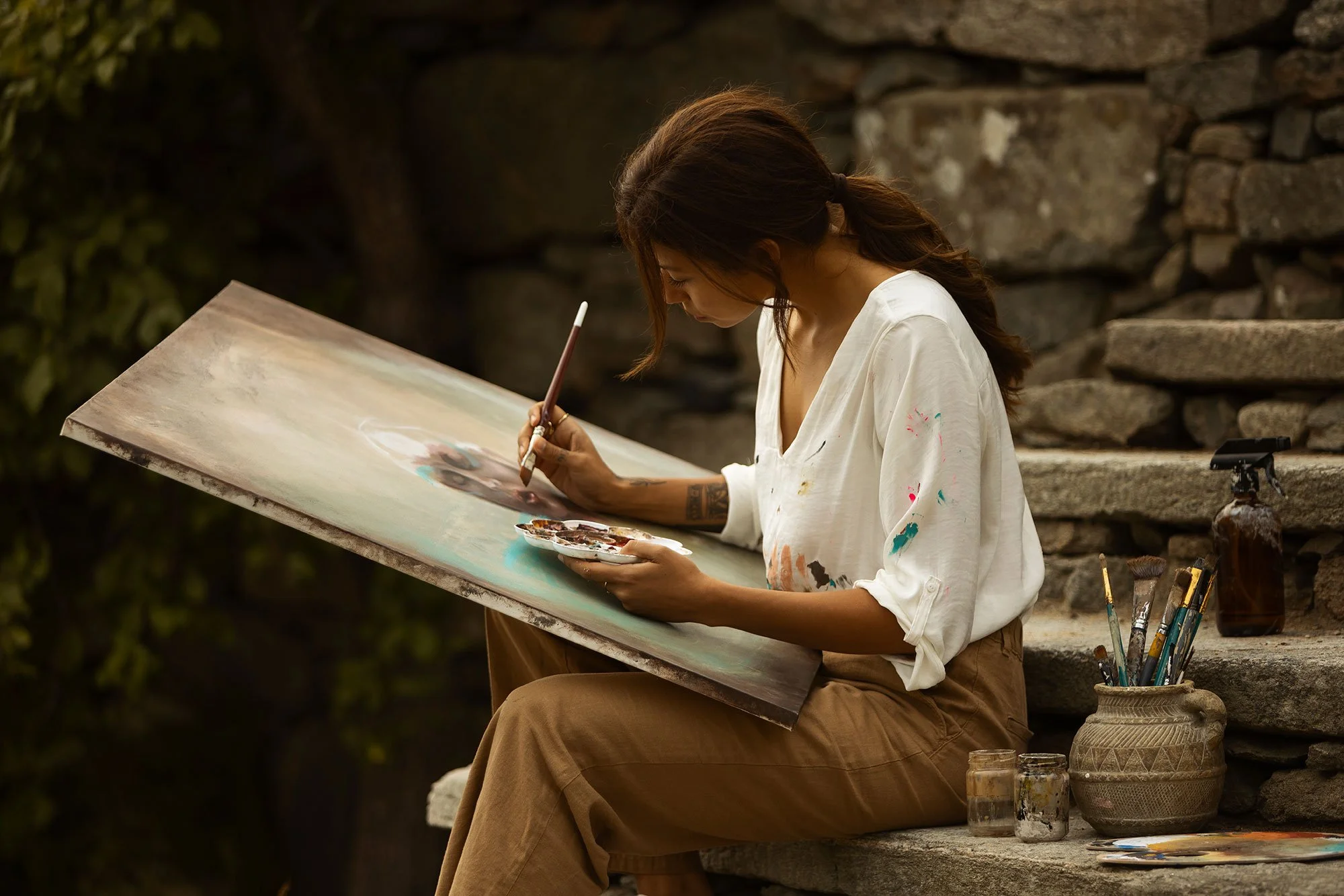 girl painting, woman artist, female artist painting on stairs, dark achademia artist portrait, poet photography female,