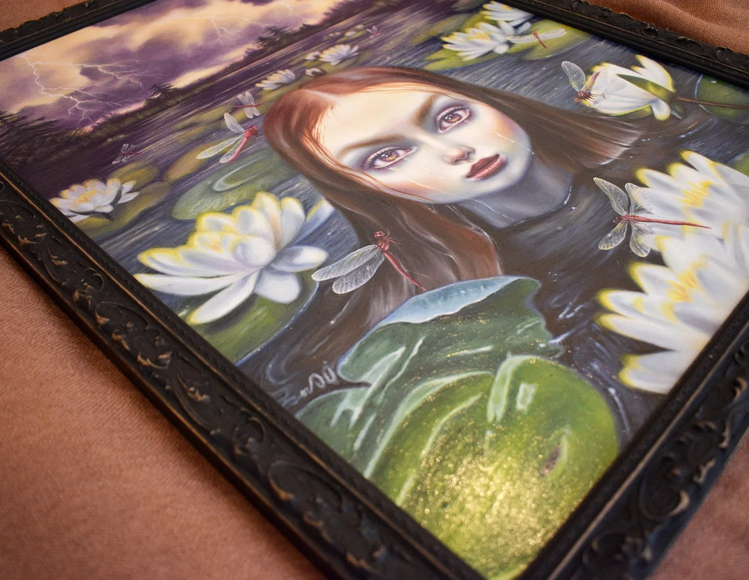 Original Oil Painting of a girl crying in a lake surrounded by dragonflies and lotus flowers with stormy skies behind