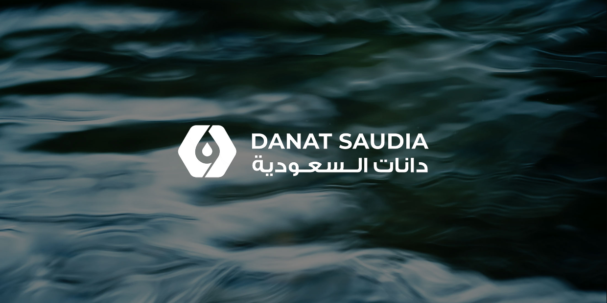 DANAT SAUDIA logo over water background.