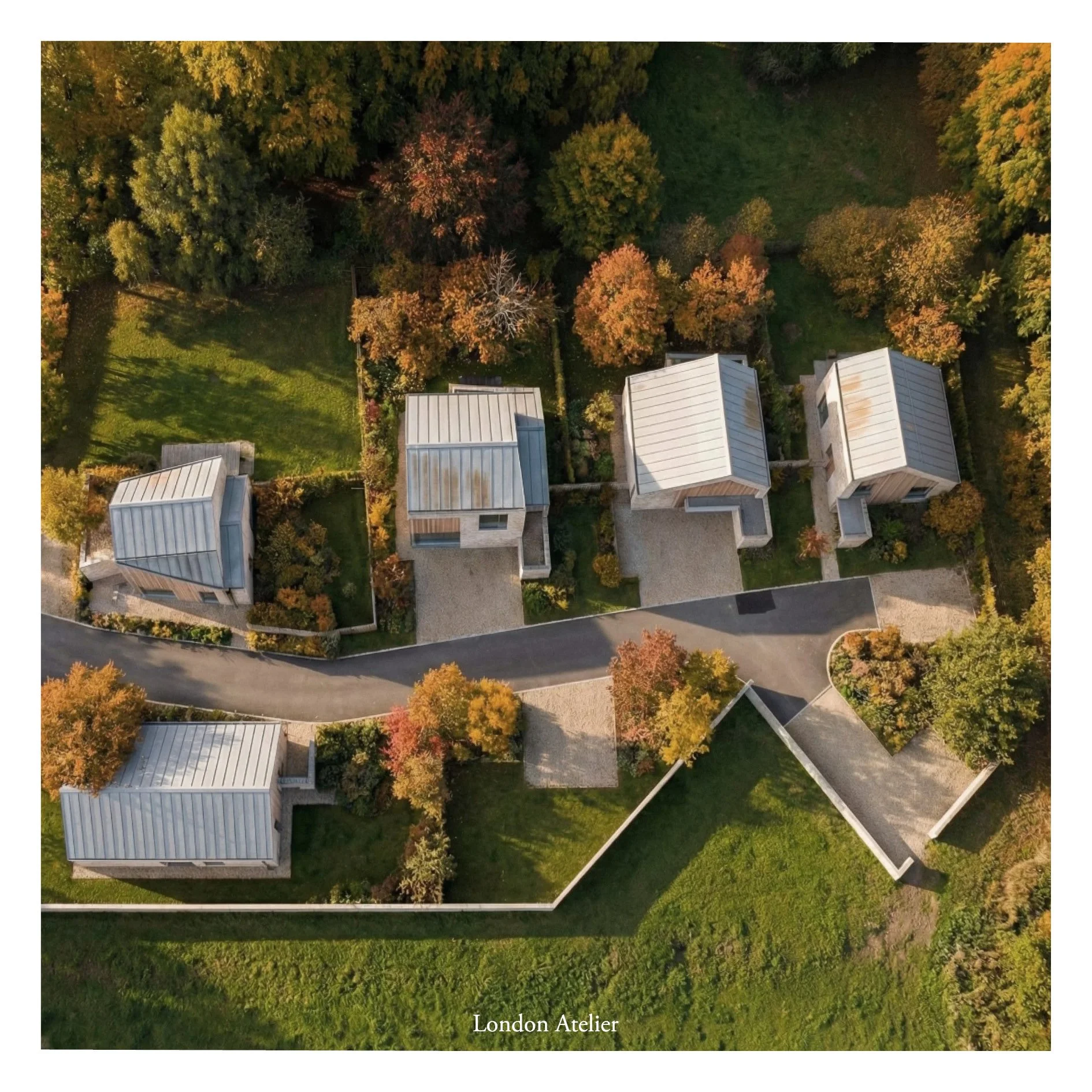 A Split Form Within the Landscape: This proposal includes six family homes set within a landscape-first plot. Each house is formed from split volumes and varied roof pitches that reduce scale and respond to light and landscape. Learn more about the p