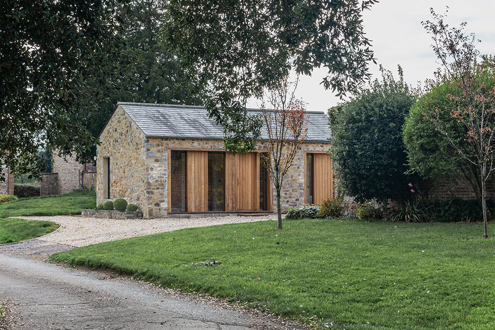 Contemporary barn conversion retaining original stone walls