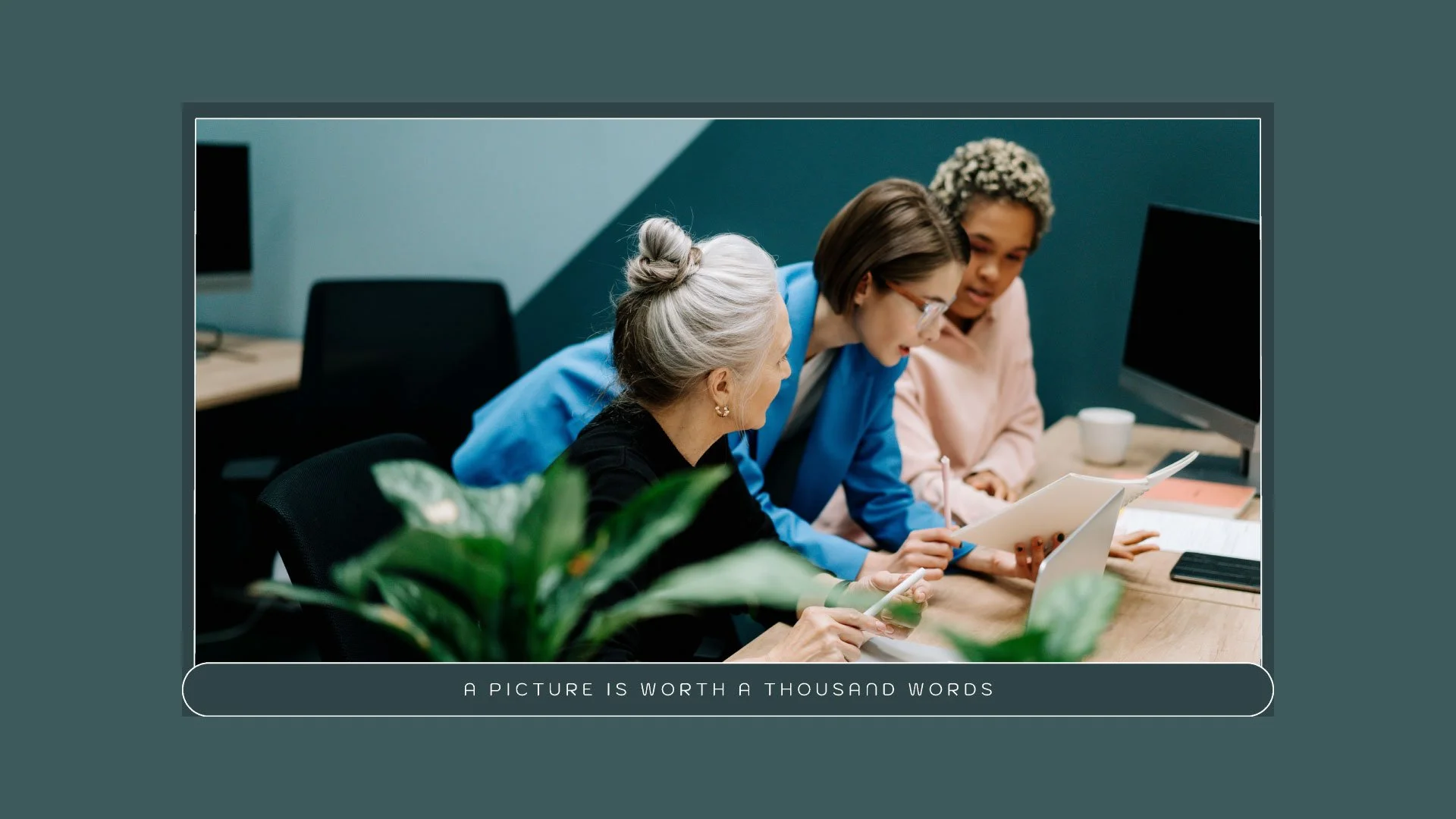 Strategic Product Roadmap presentation page featuring a photo and quote, ‘A Picture is Worth a Thousand Words,’ in a monochromatic, minimal design by Quirk Design Studio