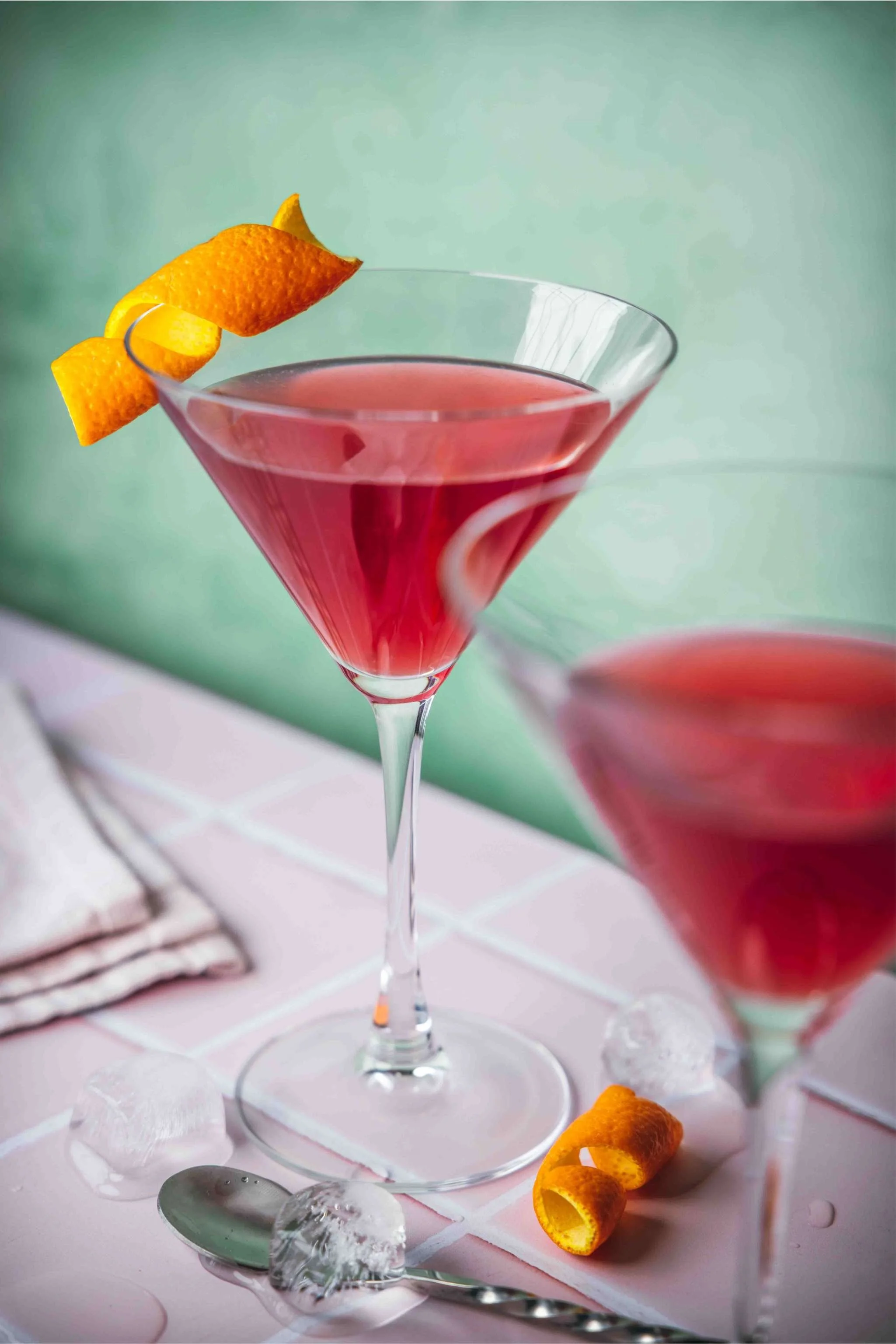 pomegranate cosmopolitan in martini glasses