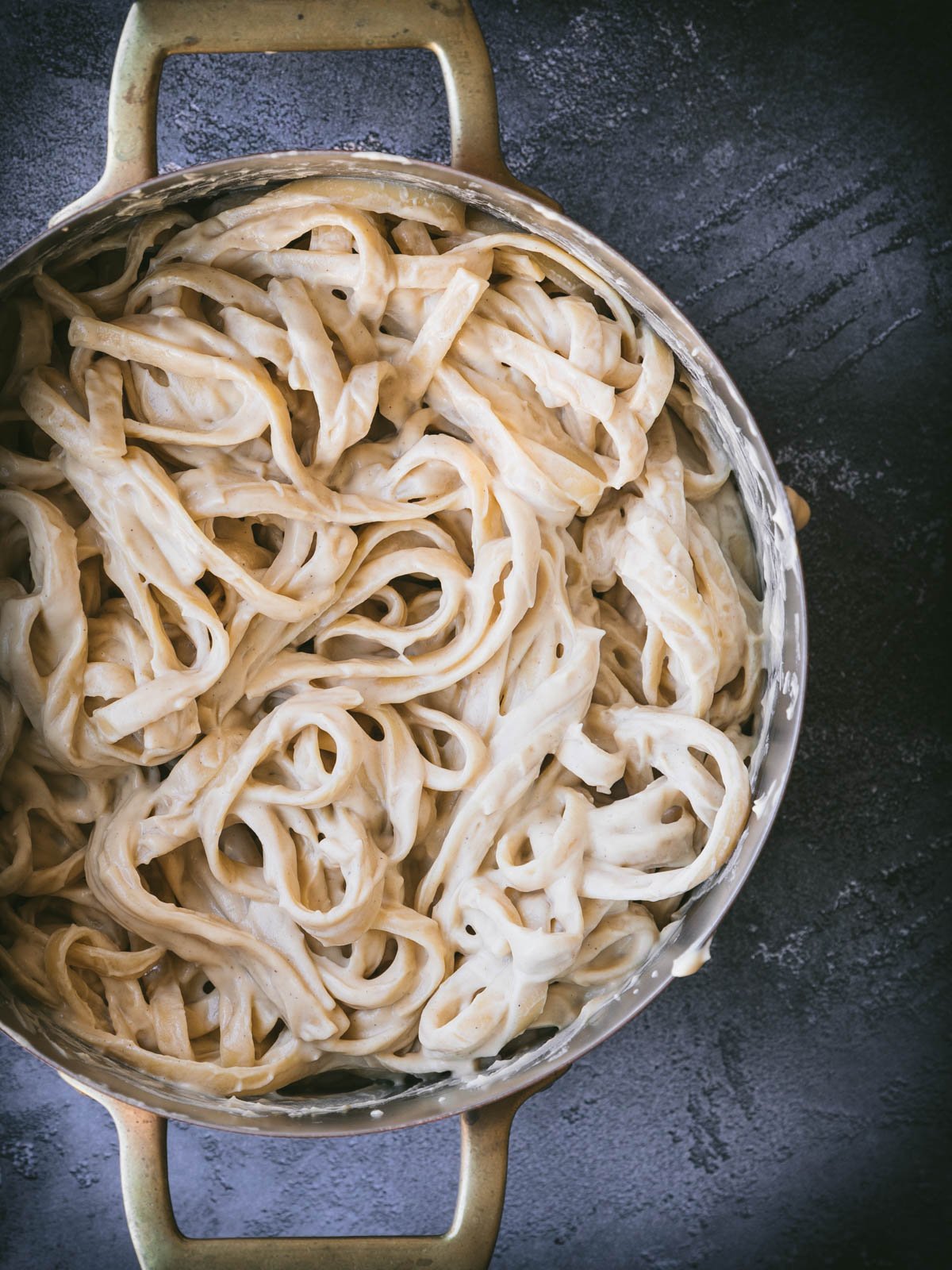 Cauliflower alfredo pasta in a pot.