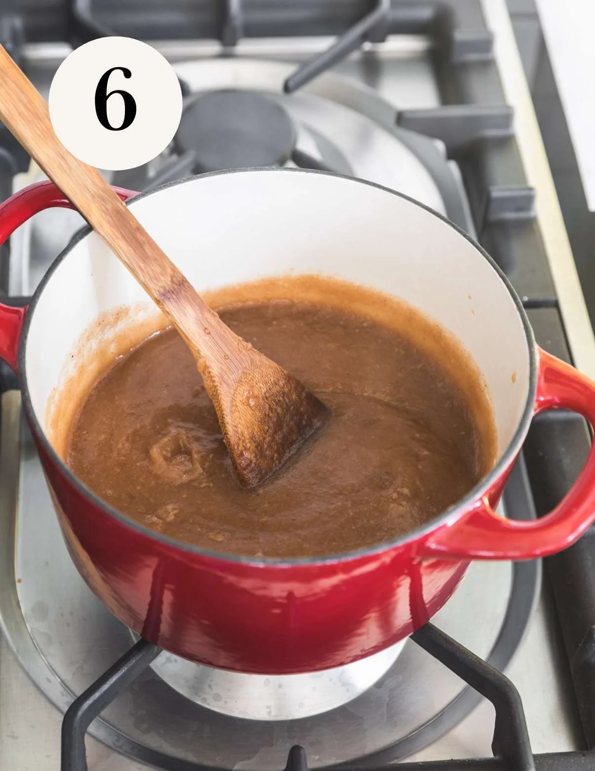 Apple butter on the stovetop cooking.