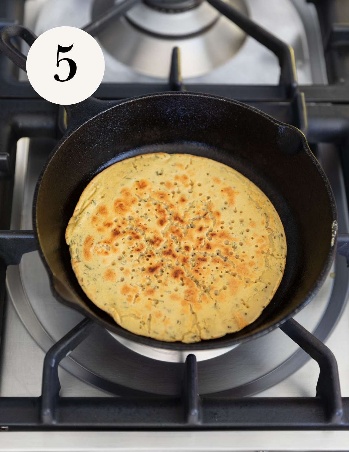 Cook the second side.