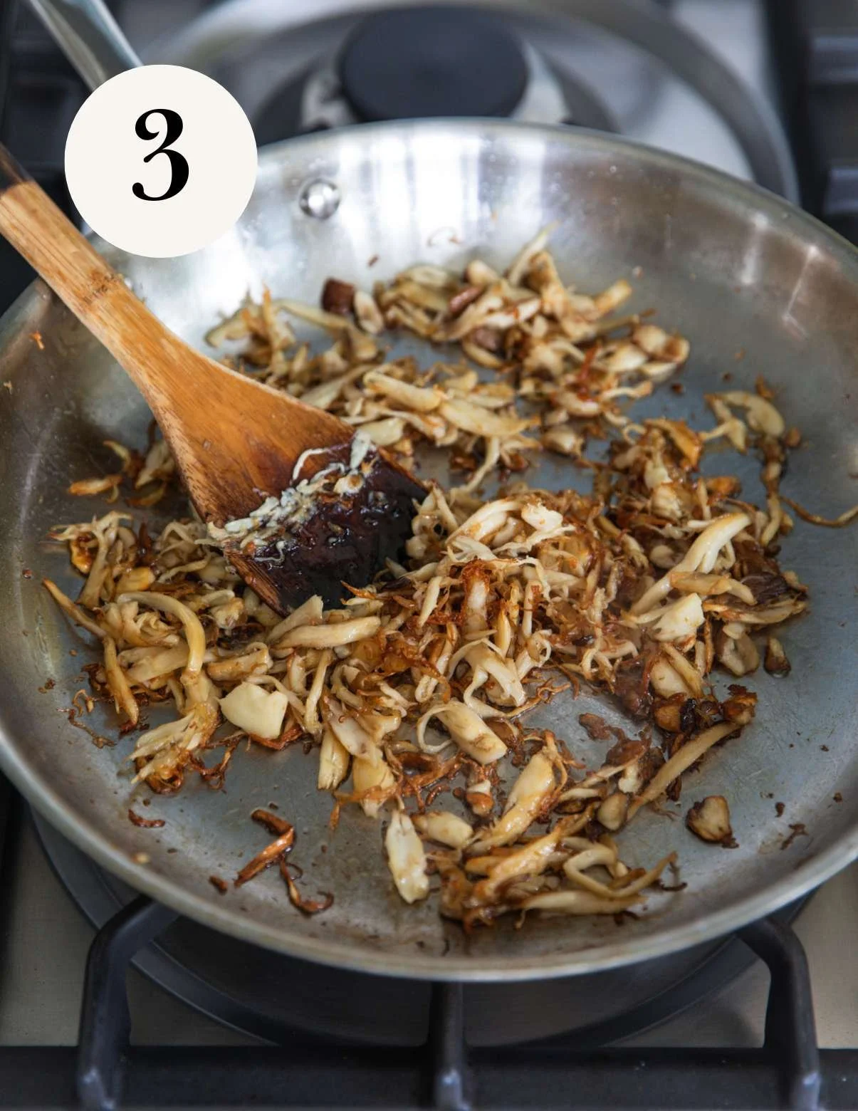 Sautéed pulled mushrooms in a pan. 