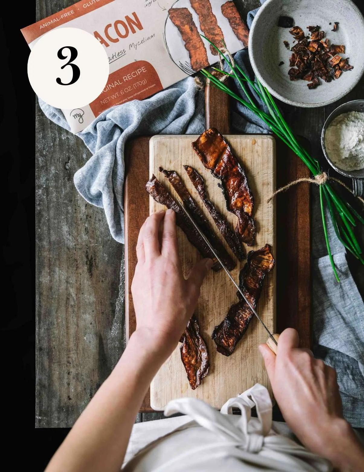 slicing vegan bacon into vegan bacon bits