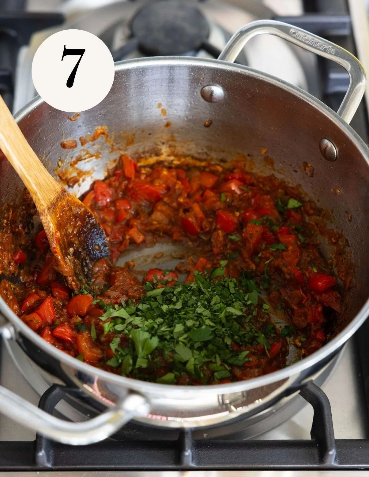 adding parsley to the pan