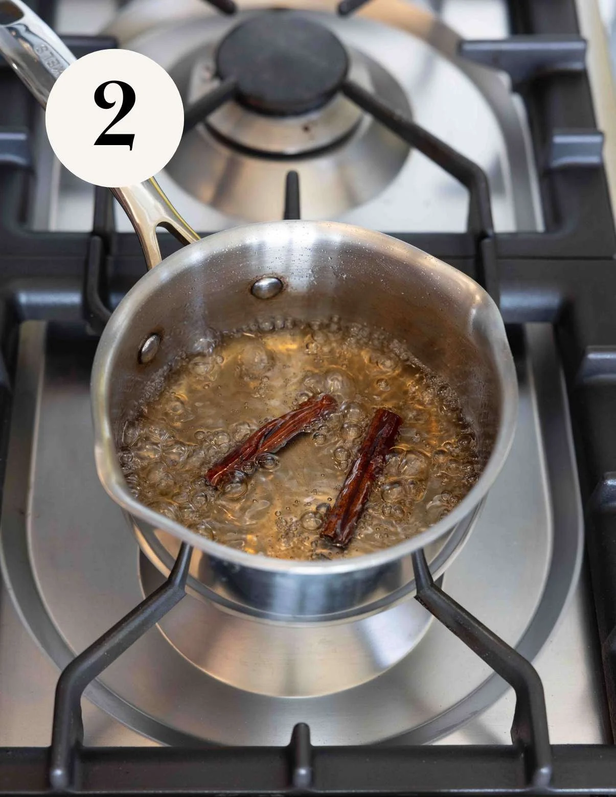 adding cinnamon sticks for cinnamon simple syrup