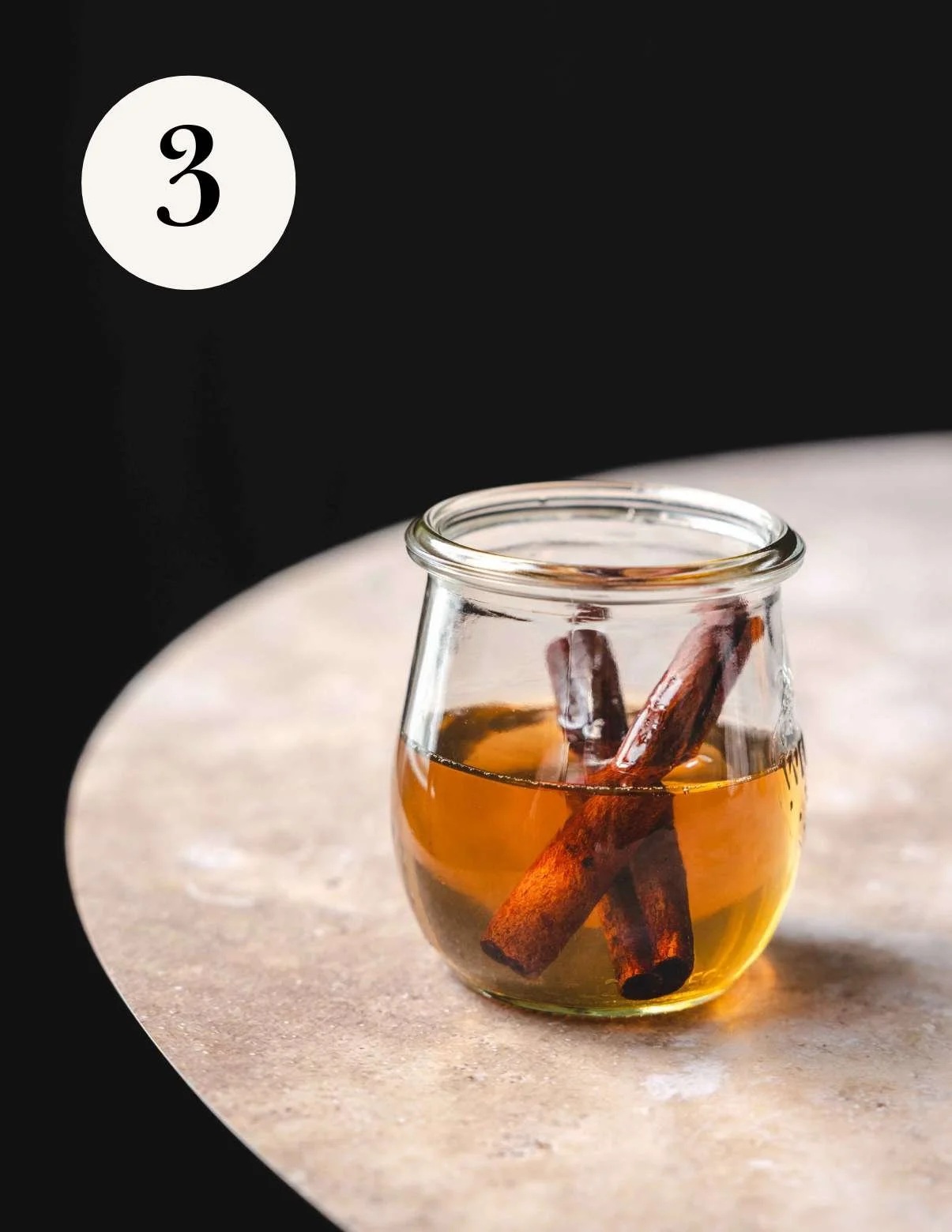 cinnamon simple syrup in a glass jar