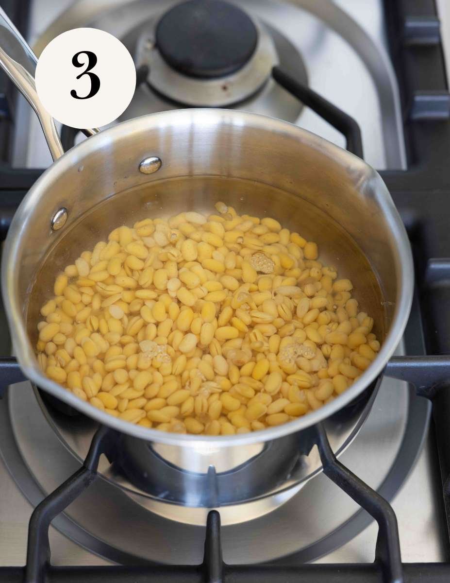 simmering deskinned soybeans