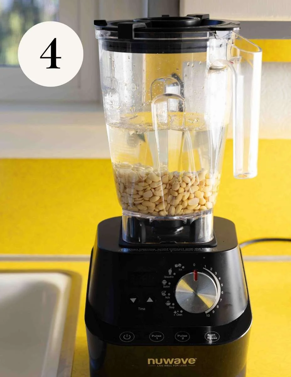 soybeans and water in a high speed blender