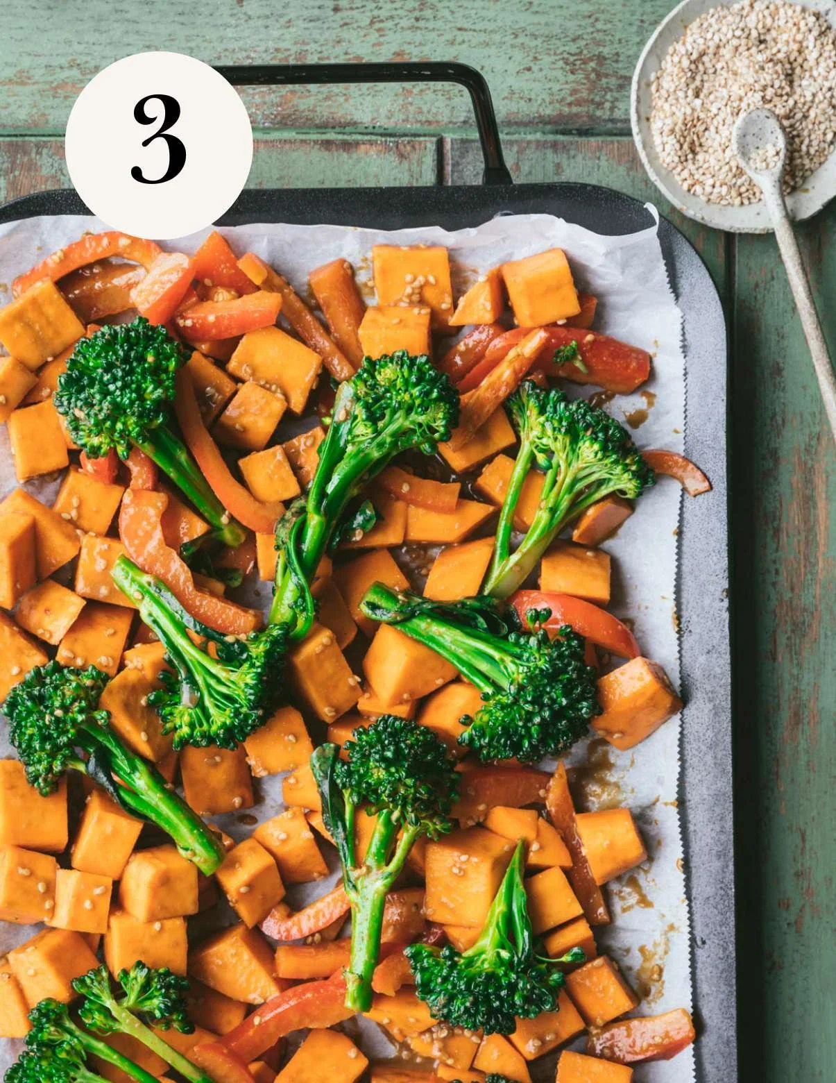 vegetables on a baking tray lined with parchment paper