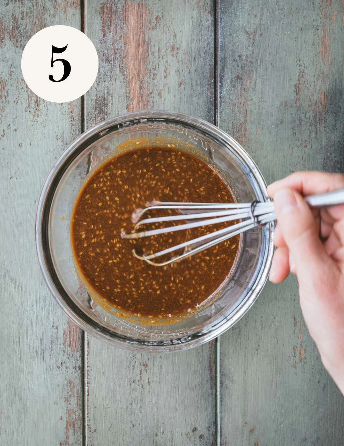 whisking sesame ginger sauce