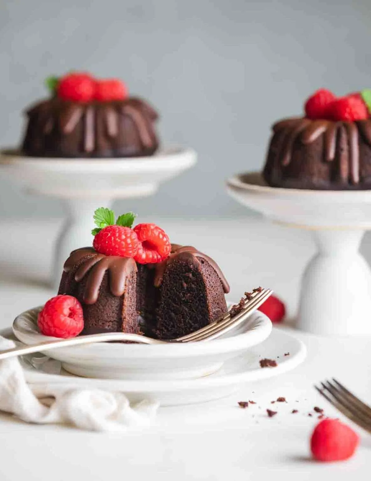 drizzle with vegan chocolate ganache and decorate with fresh berries
