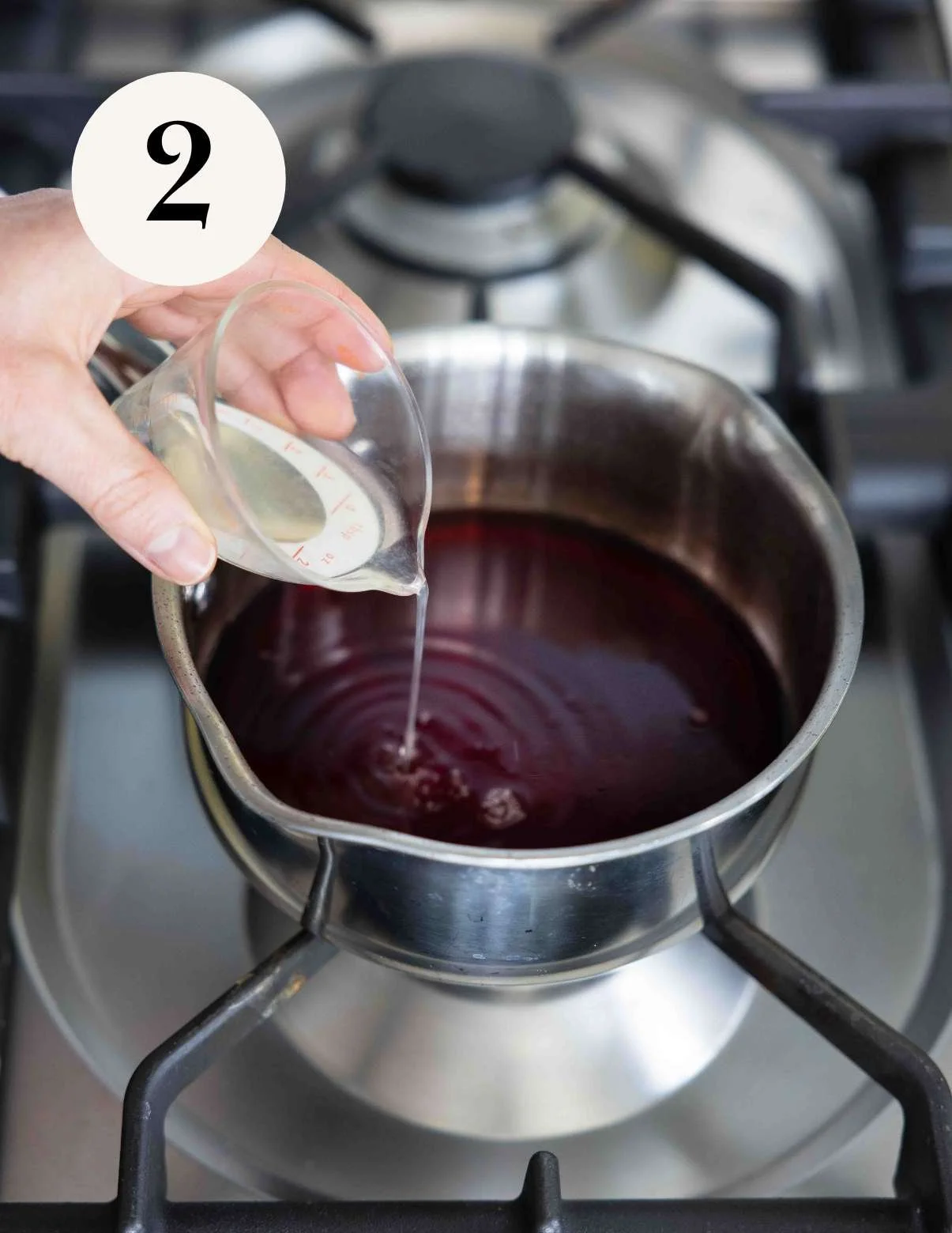 adding lemon juice to pomegranate simple syrup