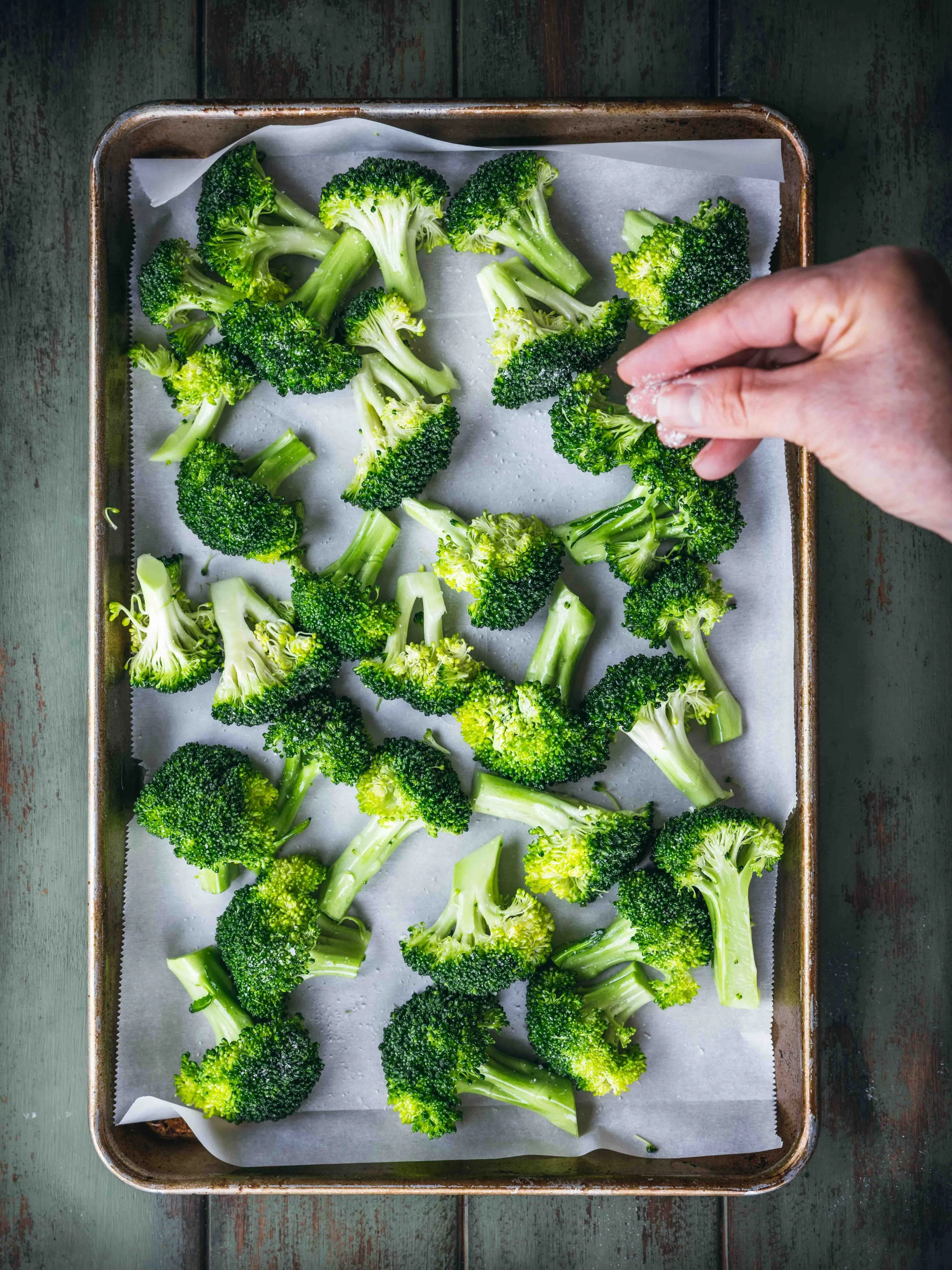 broccoli on a baking tray with salt