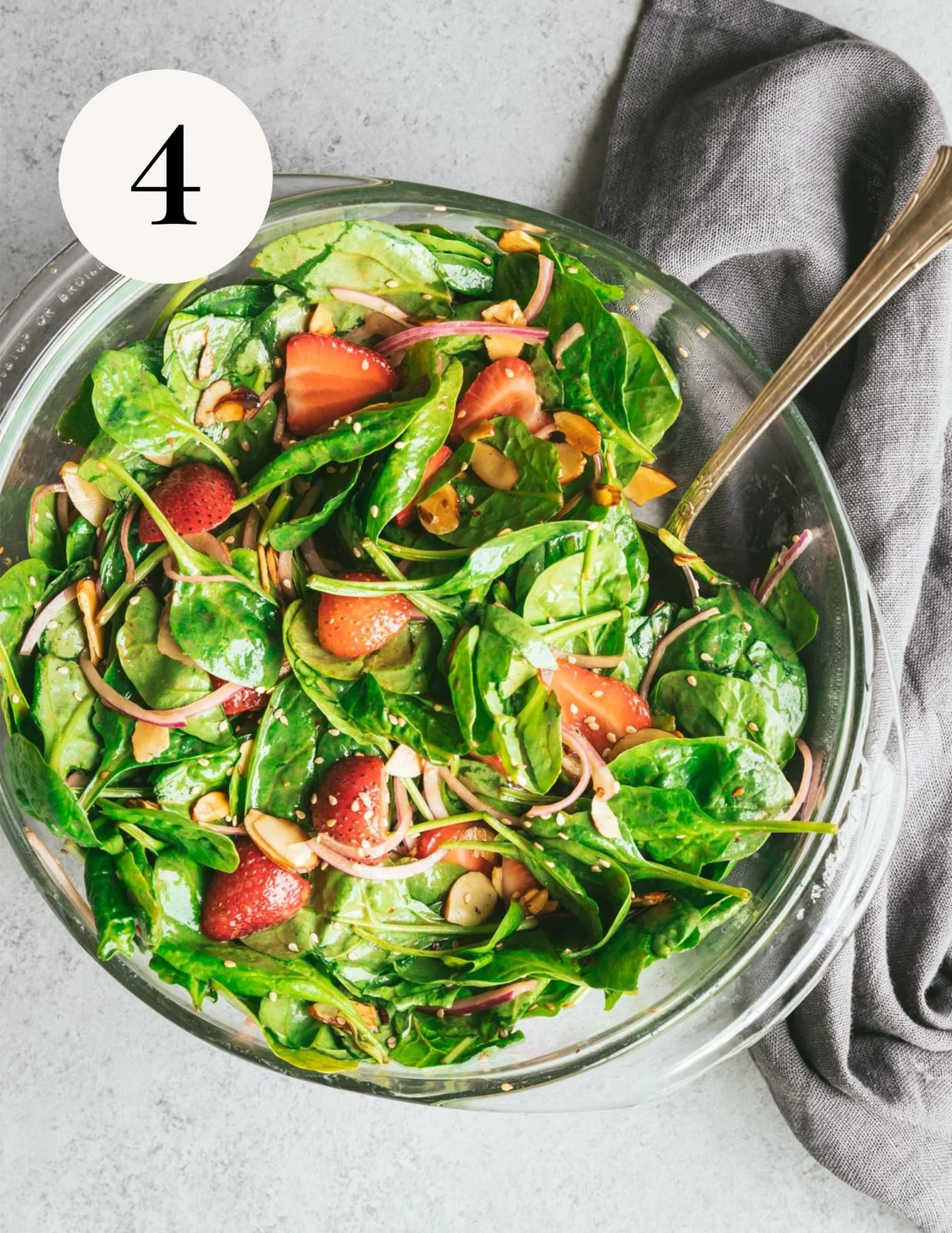 vegan spinach salad in a bowl