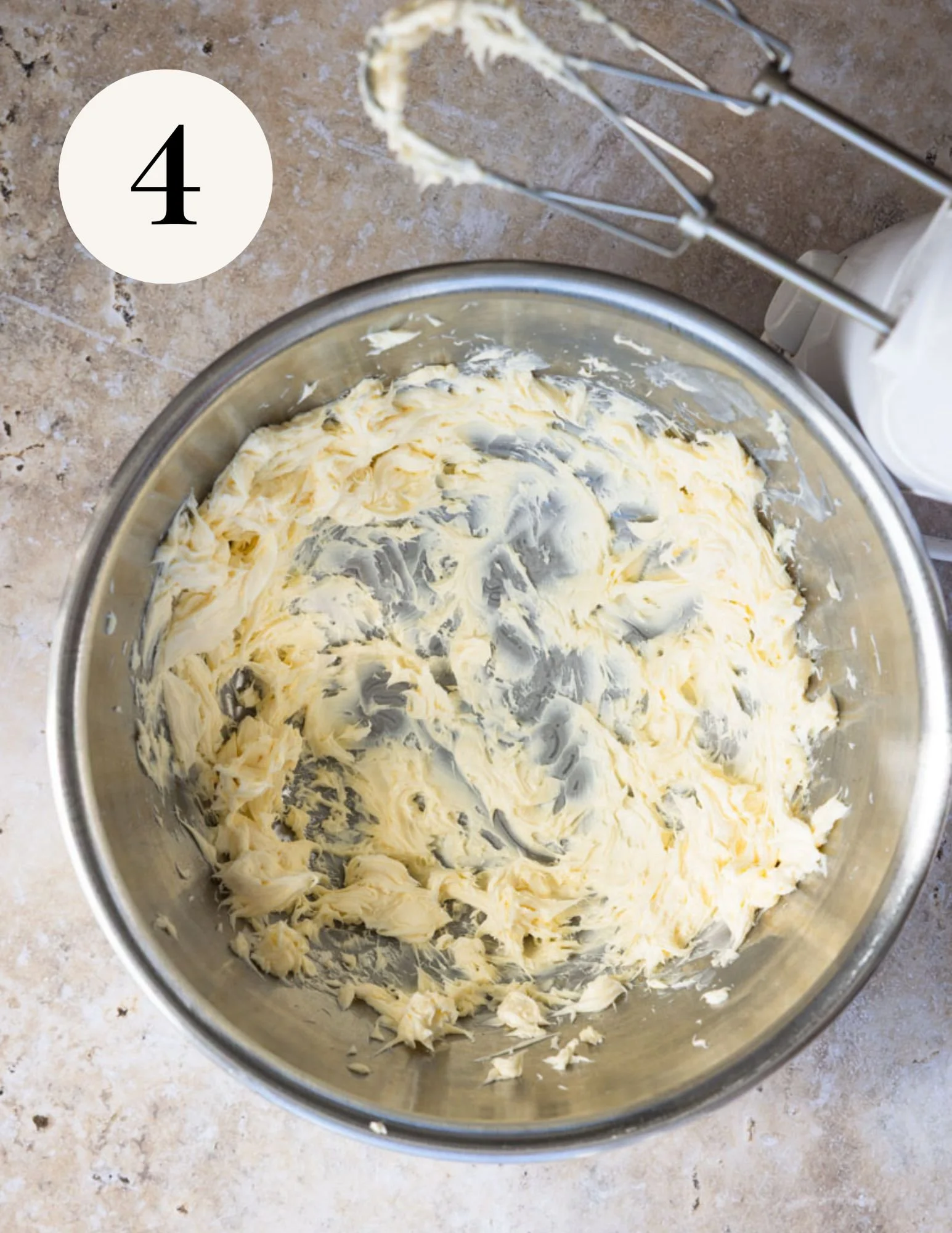 whipping vegan butter in a mixing bowl