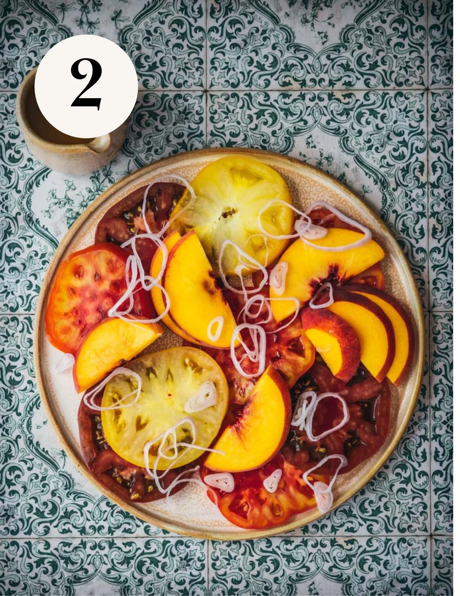 assembling tomato crudo with stone fruit