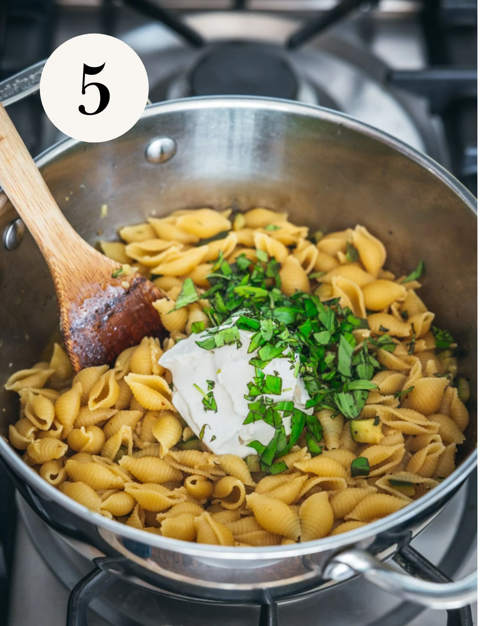Fold in the vegan sour cream and the other 2 tablespoons of fresh basil