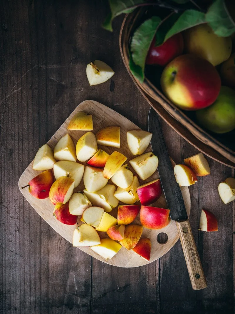 chopping apples for apple cider