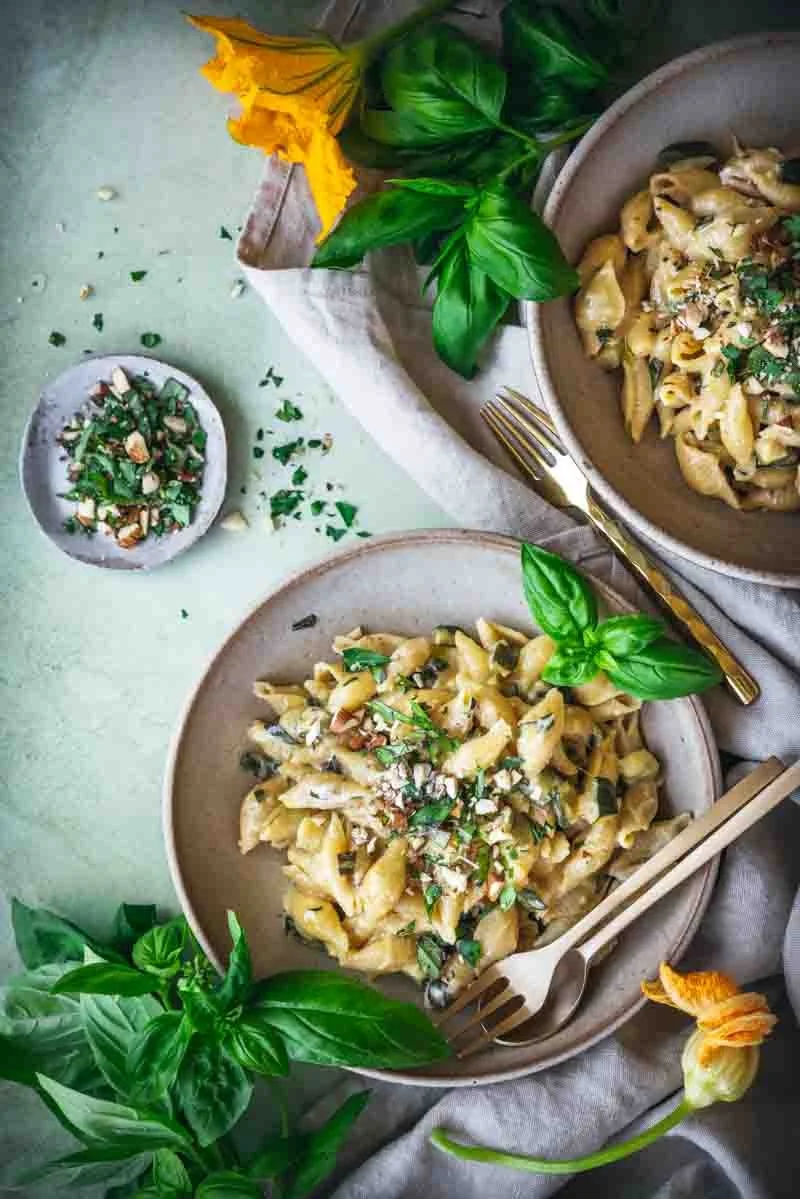 creamy zucchini pasta with herb and almond topping